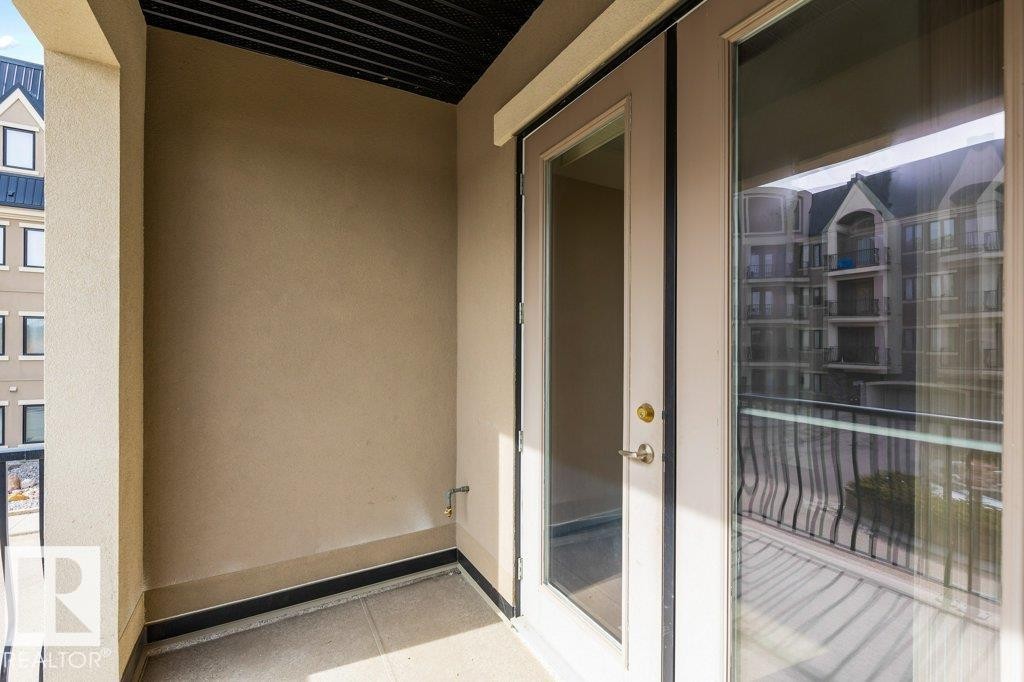 206 6083 Maynard Way, Edmonton, AB - Outdoor With Balcony With Exterior