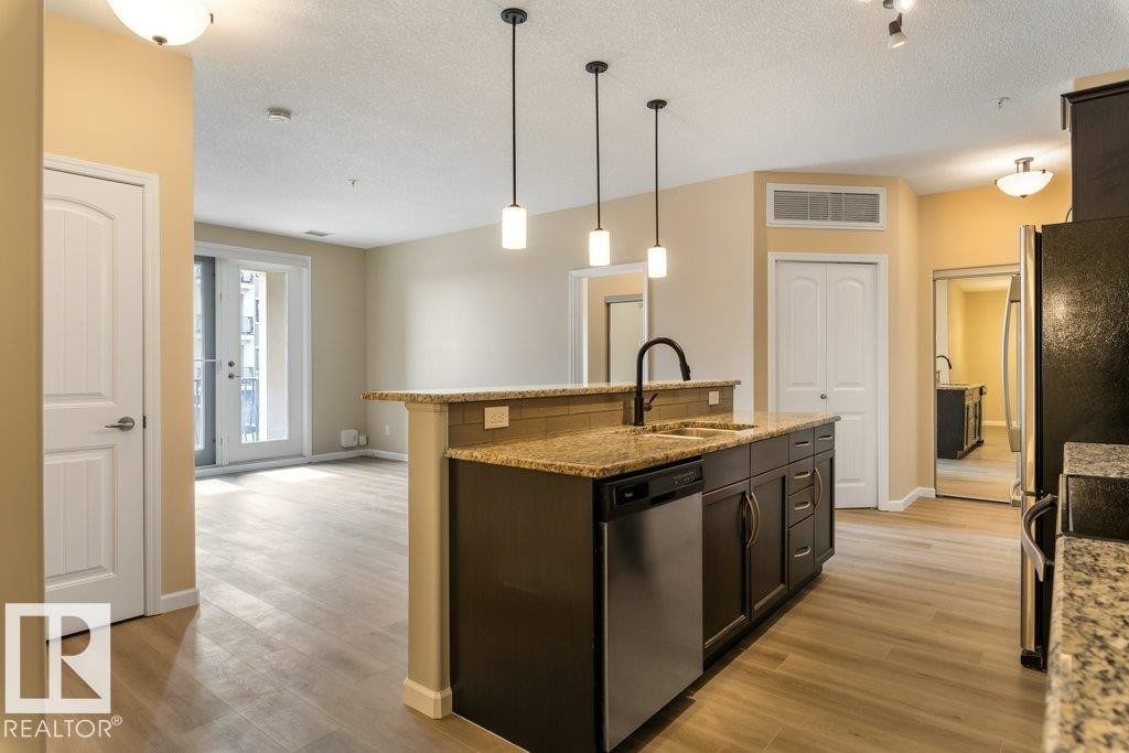 206 6083 Maynard Way, Edmonton, AB - Indoor Photo Showing Kitchen