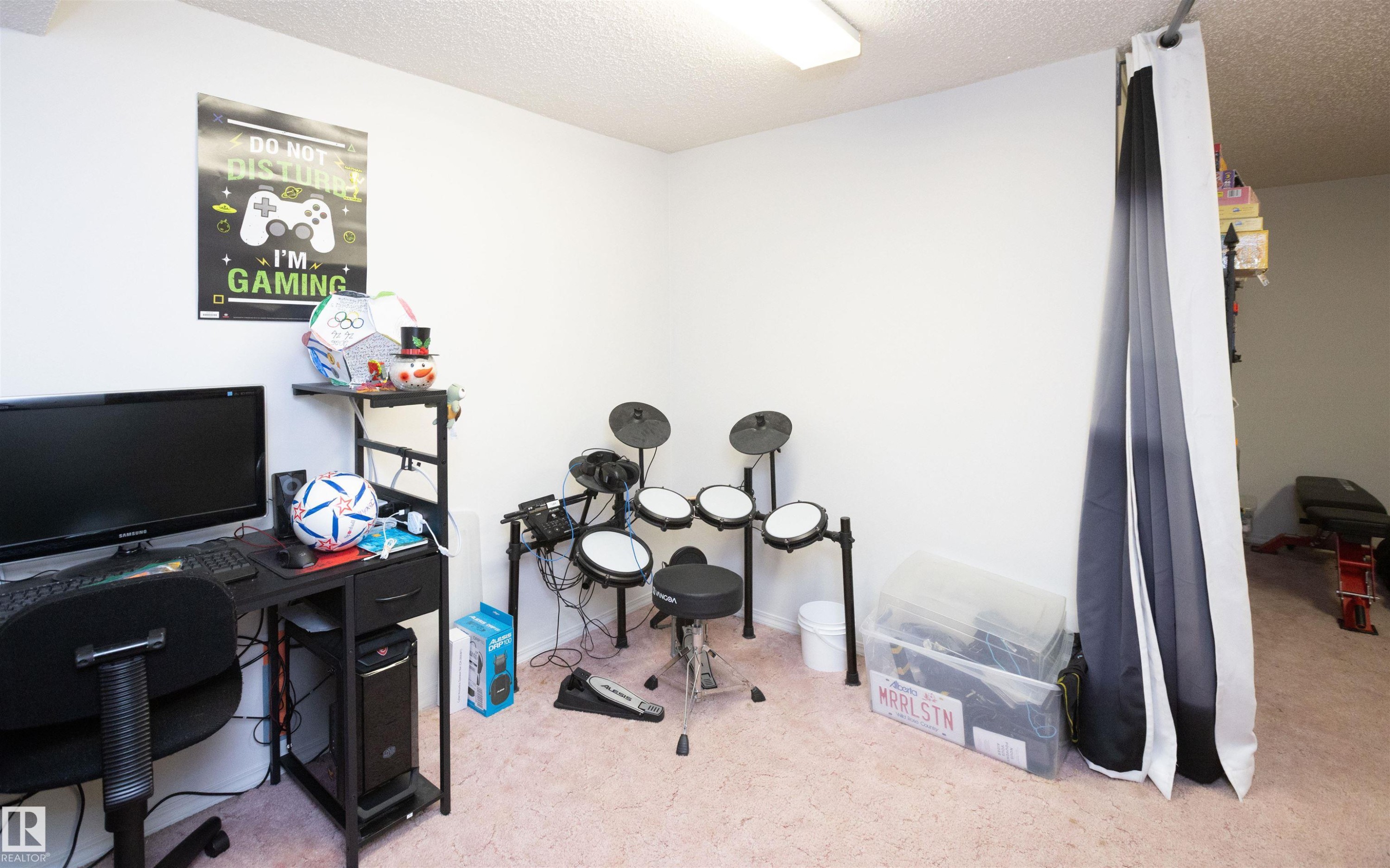 This room features light-colored carpeting and white walls, creating a bright and airy atmosphere - 4420 56 Avenue, Barrhead, AB - Indoor Photo Showing Office