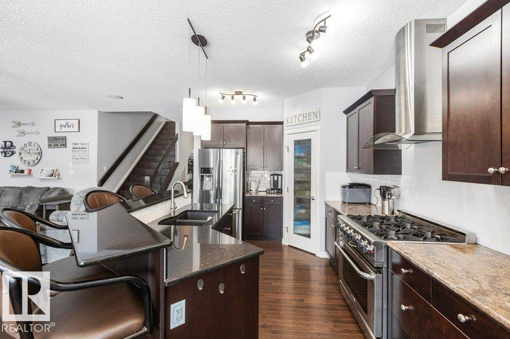 6105 17A Avenue, Edmonton, AB - Indoor Photo Showing Kitchen With Double Sink With Upgraded Kitchen