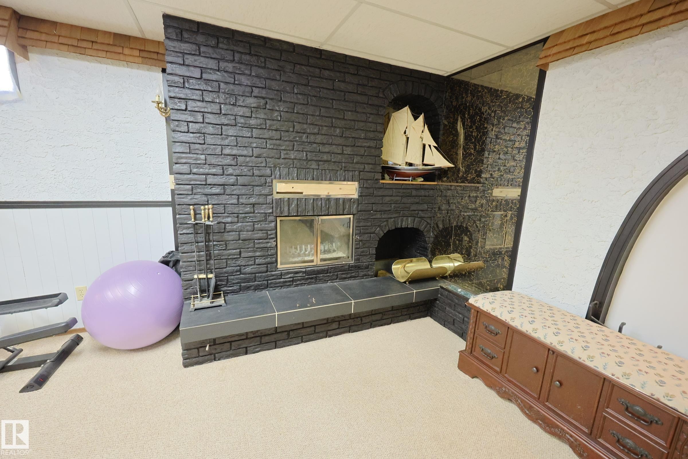 37 Armstrong Crescent, Leduc, AB - Indoor Photo Showing Other Room With Fireplace