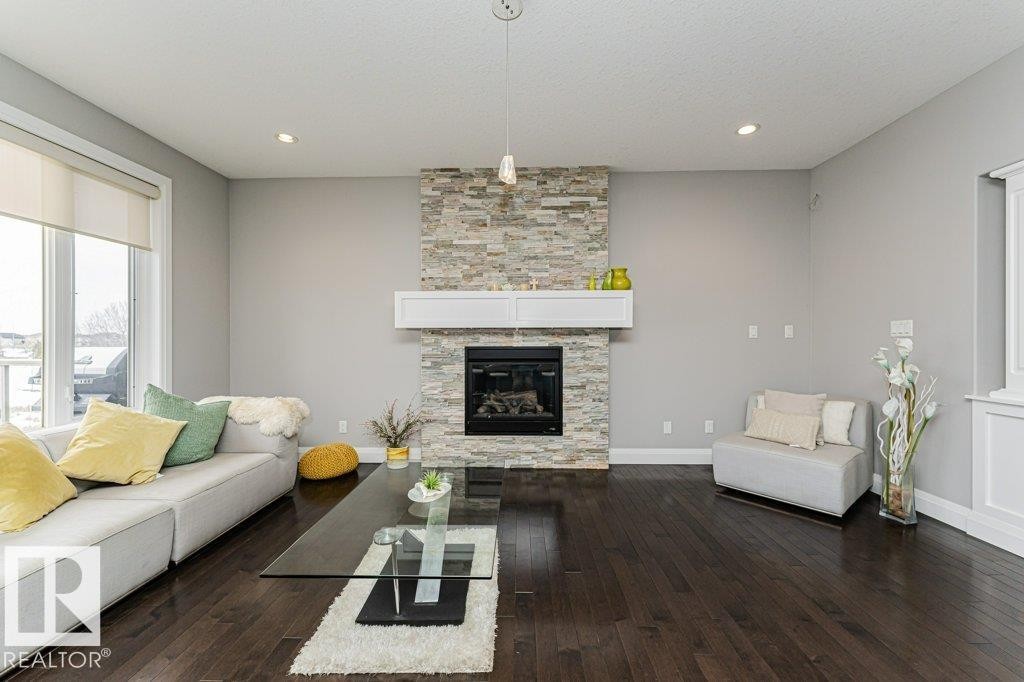 610 Albany Way, Edmonton, AB - Indoor Photo Showing Living Room With Fireplace