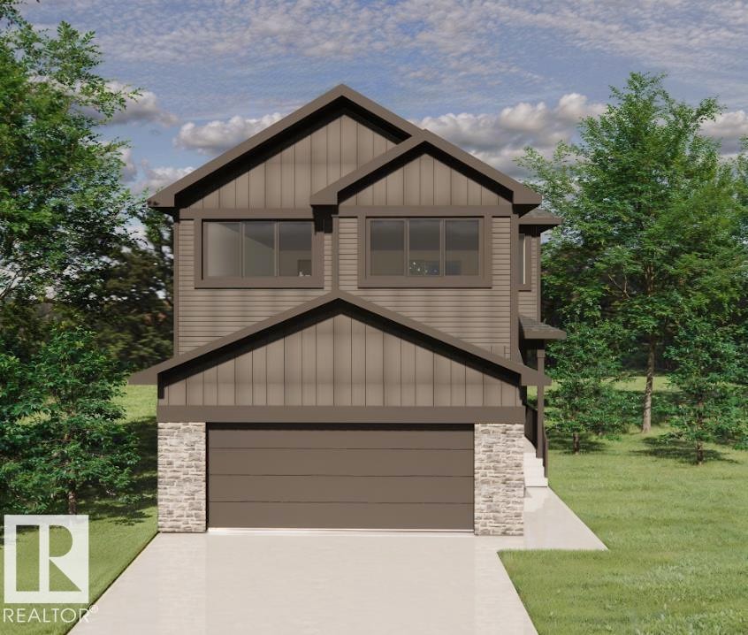 This property features a modern facade with vertical siding and stone accents, a prominent two-car garage, and a concrete driveway - 14 Grayson Green, Stony Plain, AB - Outdoor