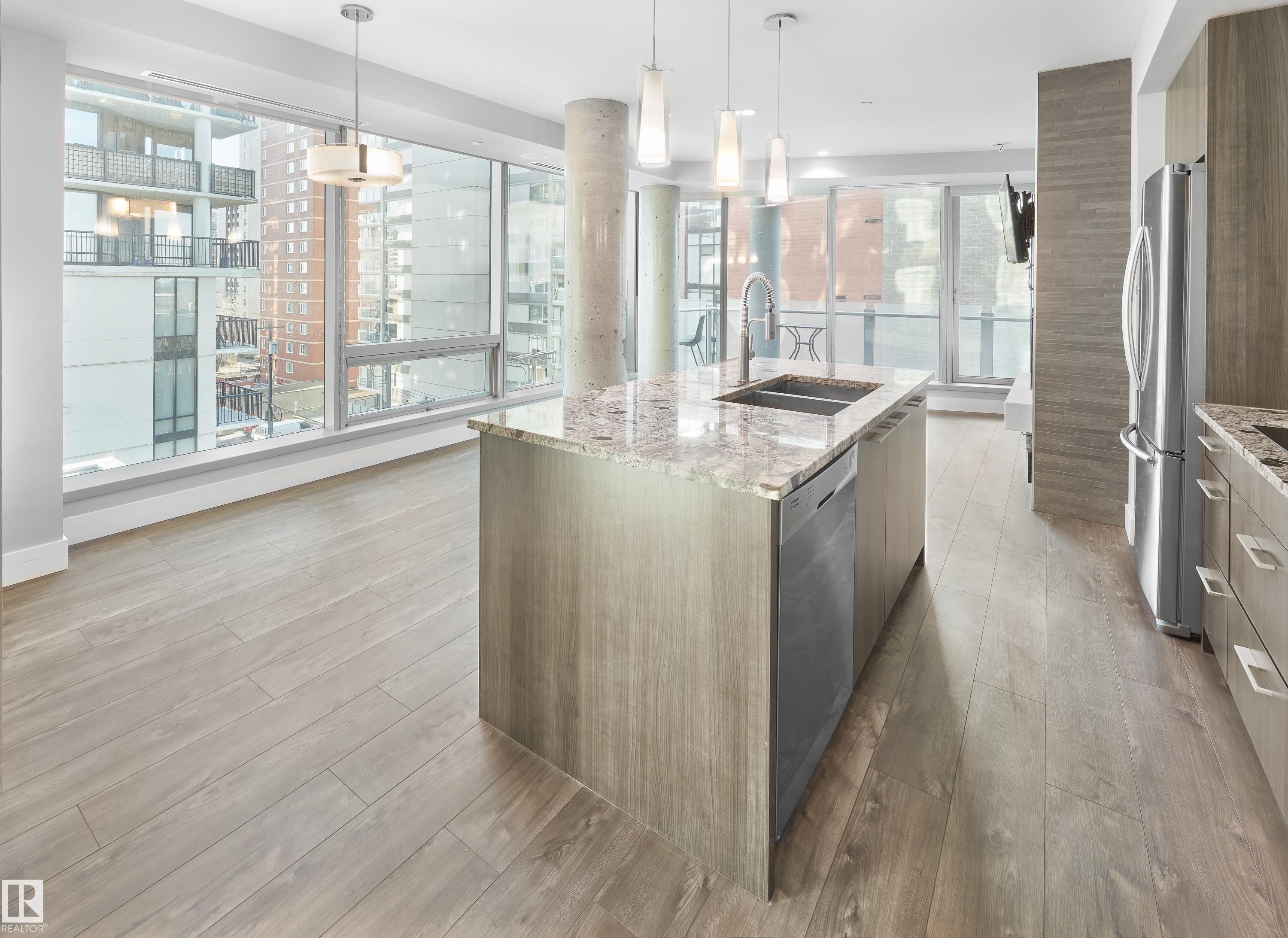 502 11969 Jasper Avenue, Edmonton, AB - Indoor Photo Showing Kitchen With Stainless Steel Kitchen With Double Sink With Upgraded Kitchen