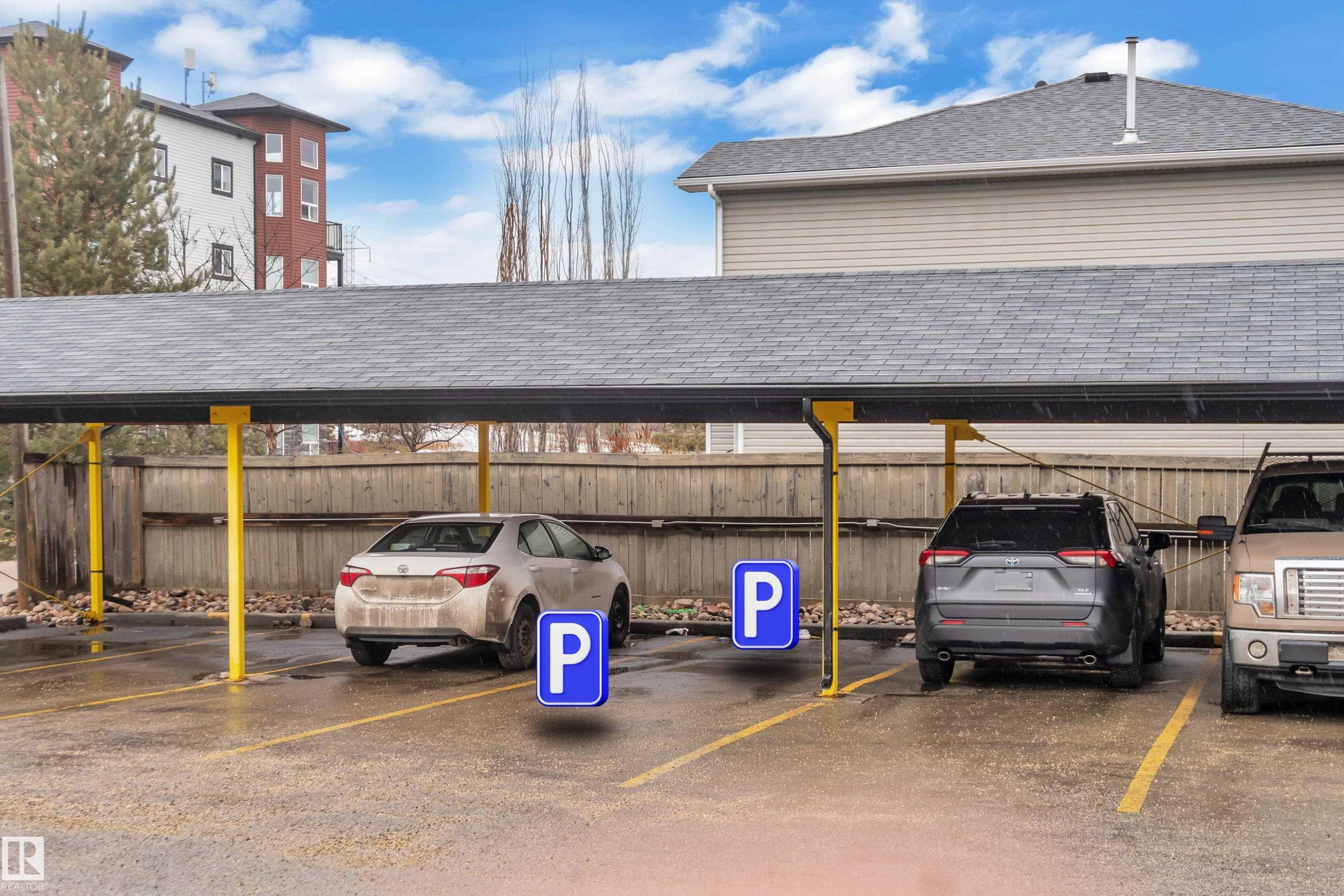 Covered parking area with designated parking spaces - 320 392 Silver Berry Road, Edmonton, AB - Outdoor