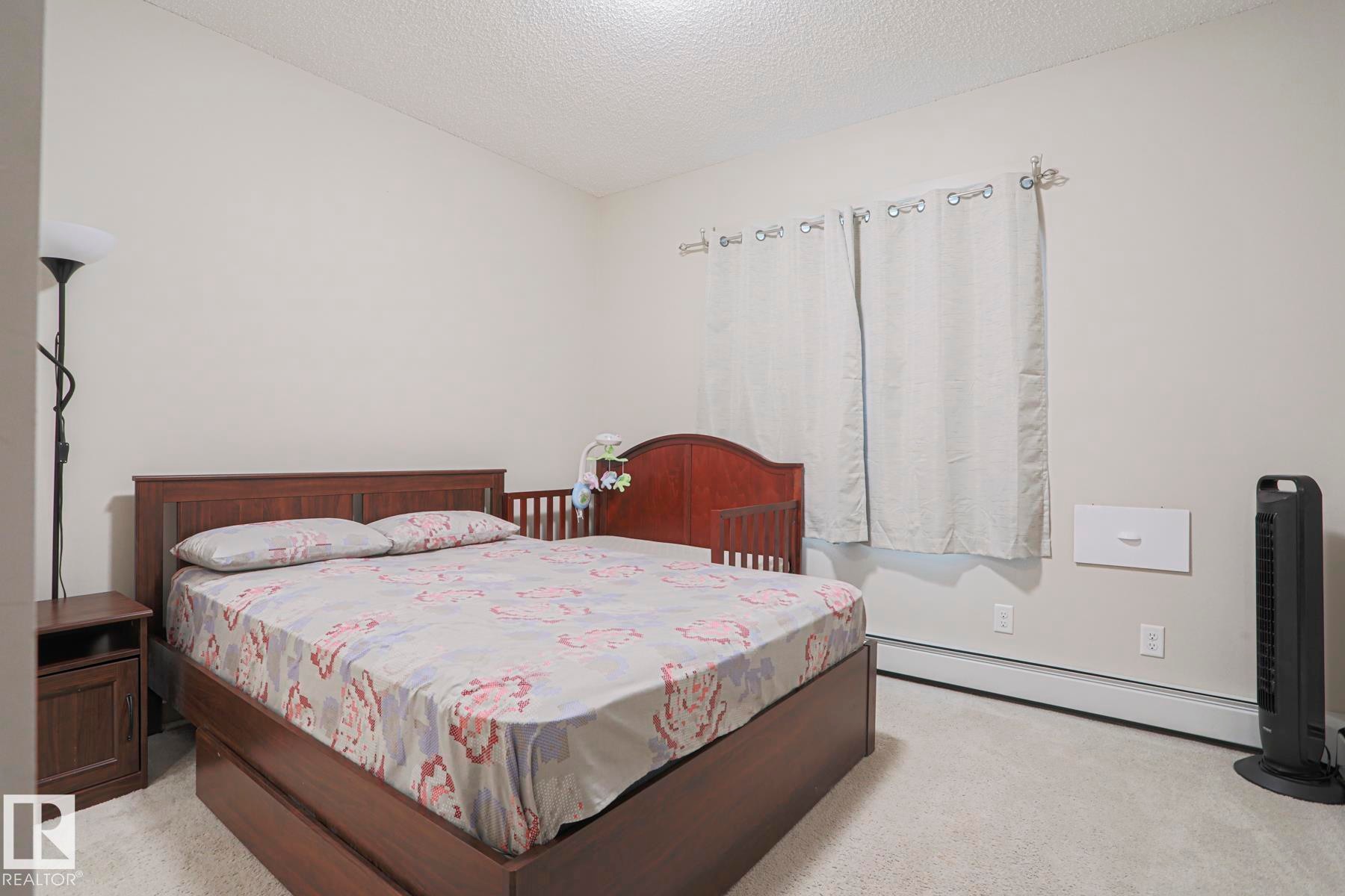 212 320 Ambleside Link, Edmonton, AB - Indoor Photo Showing Bedroom