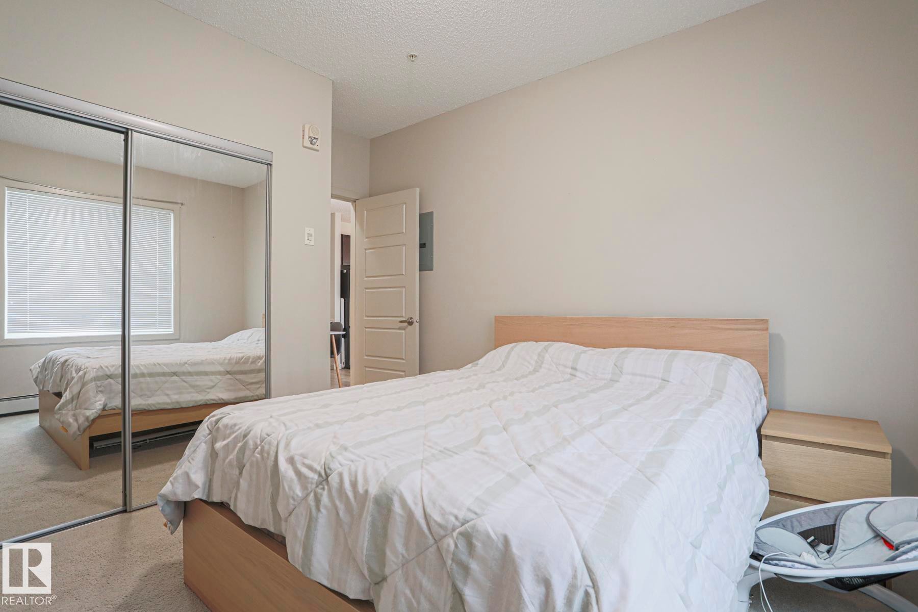 212 320 Ambleside Link, Edmonton, AB - Indoor Photo Showing Bedroom