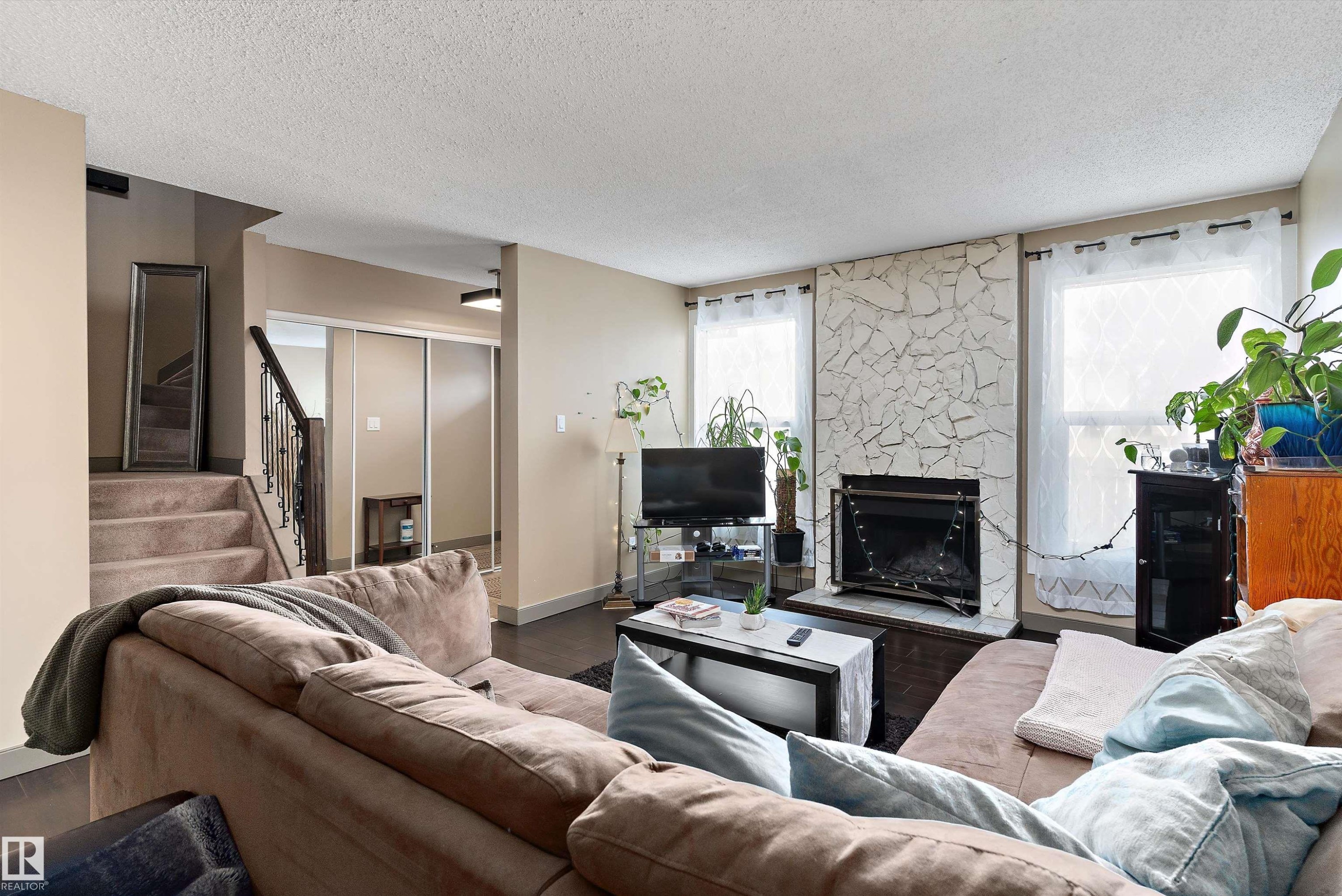 1128 Knottwood Road E, Edmonton, AB - Indoor Photo Showing Living Room With Fireplace