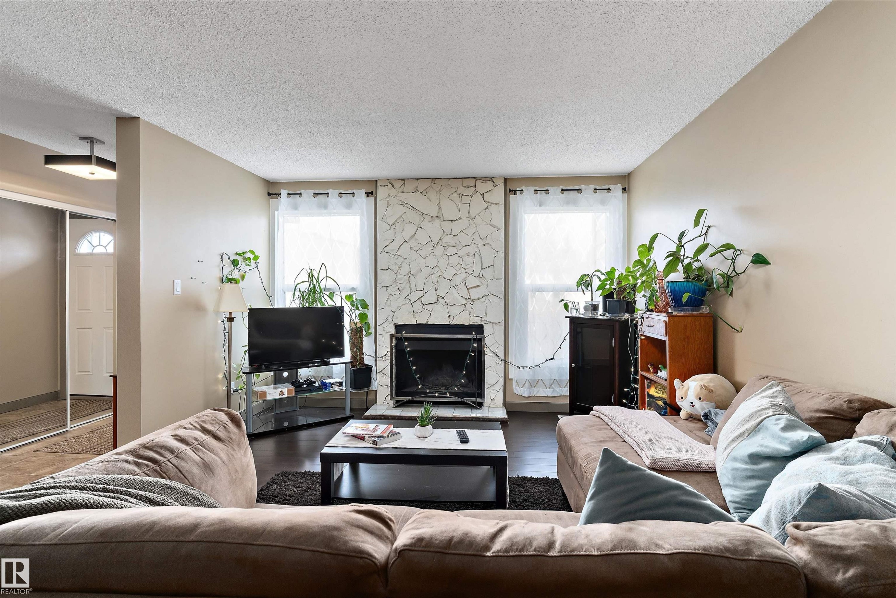 1128 Knottwood Road E, Edmonton, AB - Indoor Photo Showing Living Room With Fireplace
