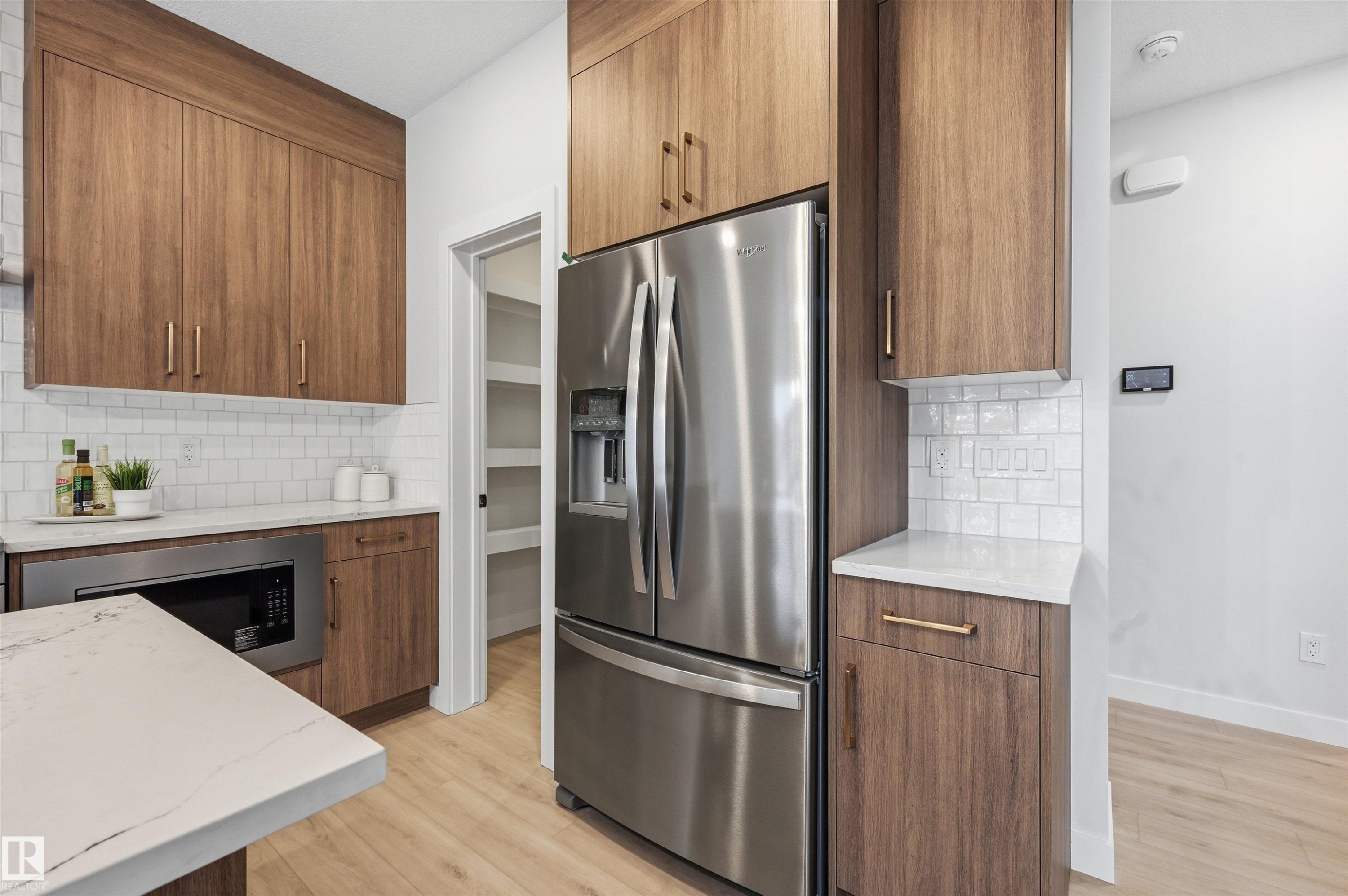 3230 Dixon Way, Edmonton, AB - Indoor Photo Showing Kitchen With Stainless Steel Kitchen