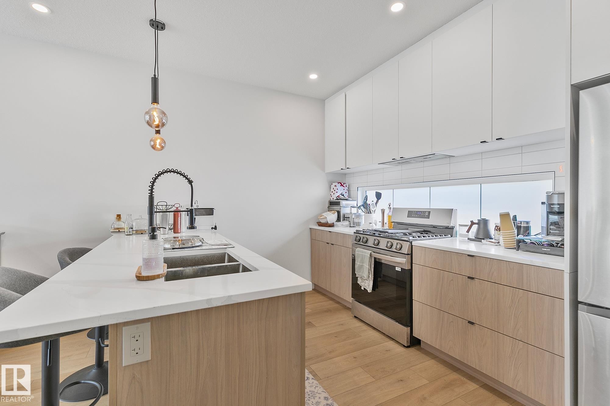 14904 109 Avenue, Edmonton, AB - Indoor Photo Showing Kitchen With Double Sink