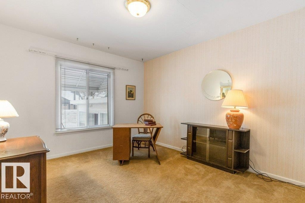 Home office featuring baseboards and light carpet - 8810 93 Street, Edmonton, AB - Indoor Photo Showing Office
