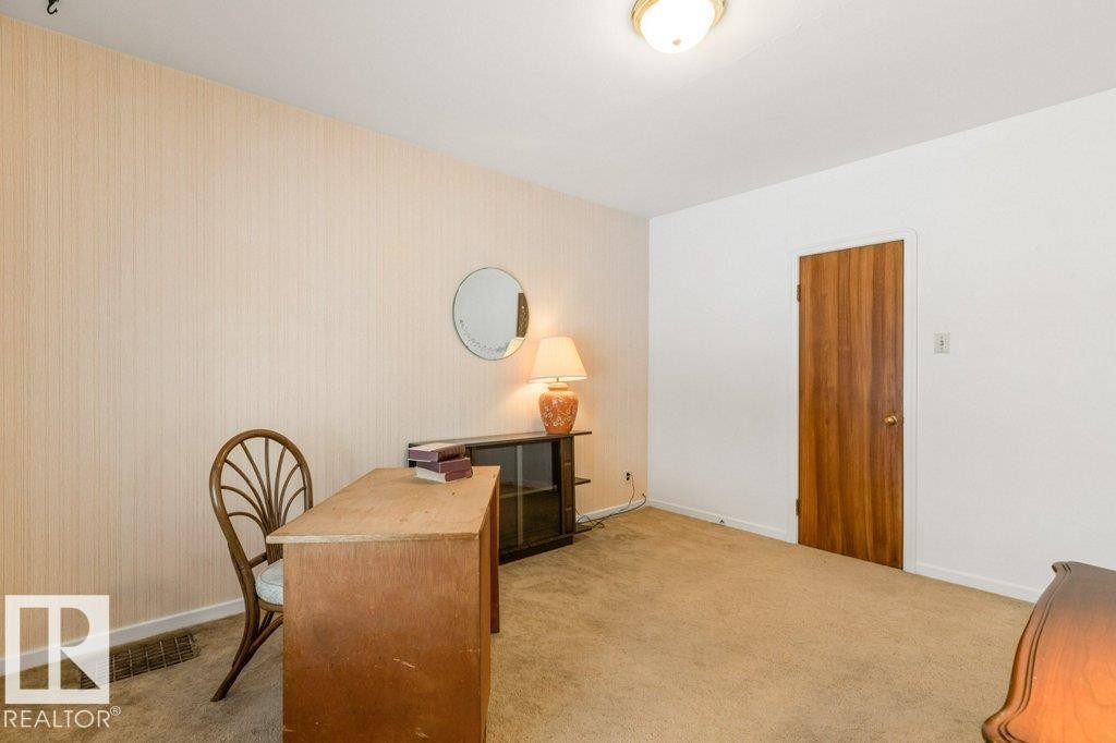 Office space featuring light carpet and baseboards - 8810 93 Street, Edmonton, AB - Indoor