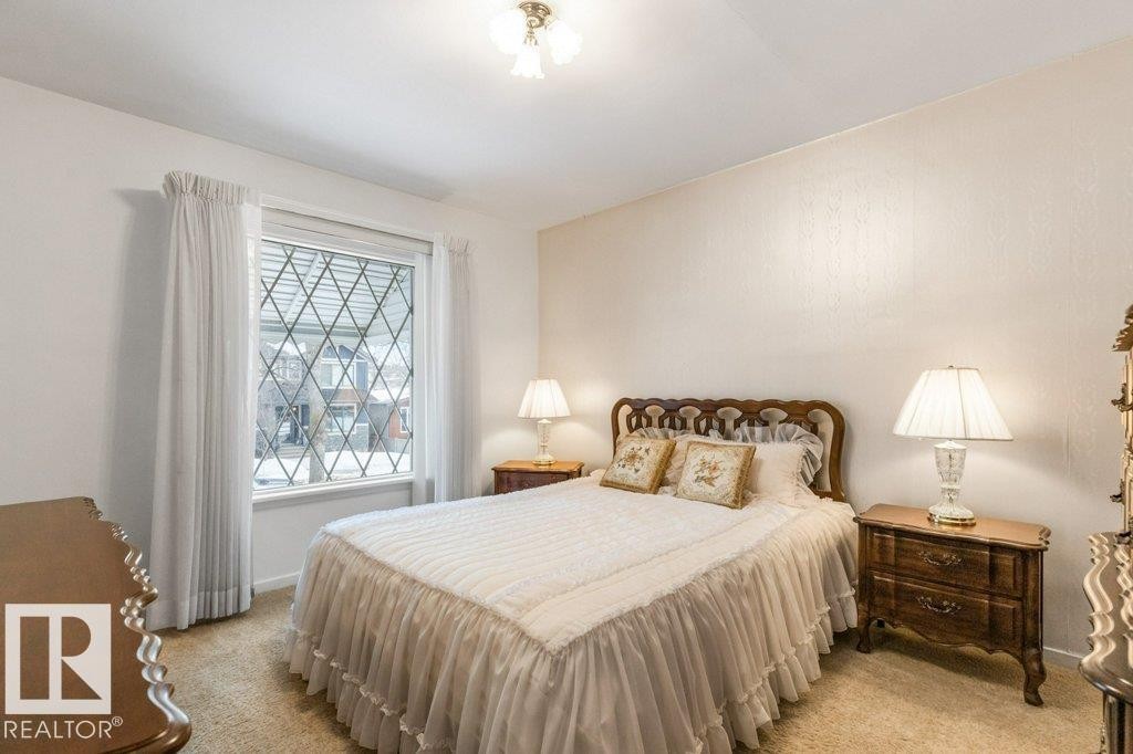 Bedroom with light carpet - 8810 93 Street, Edmonton, AB - Indoor Photo Showing Bedroom