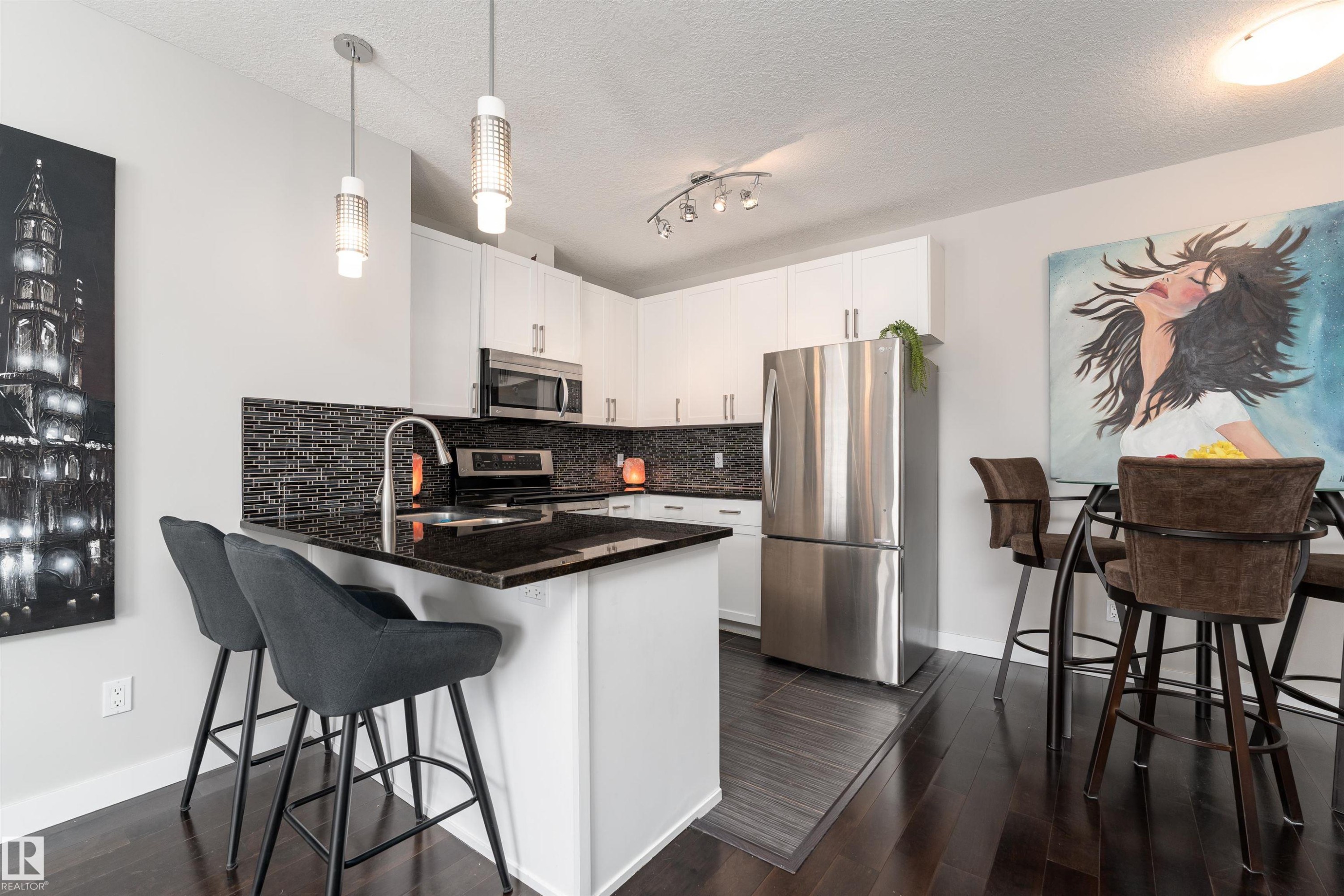 224 5151 Windermere Boulevard, Edmonton, AB - Indoor Photo Showing Kitchen With Stainless Steel Kitchen With Upgraded Kitchen