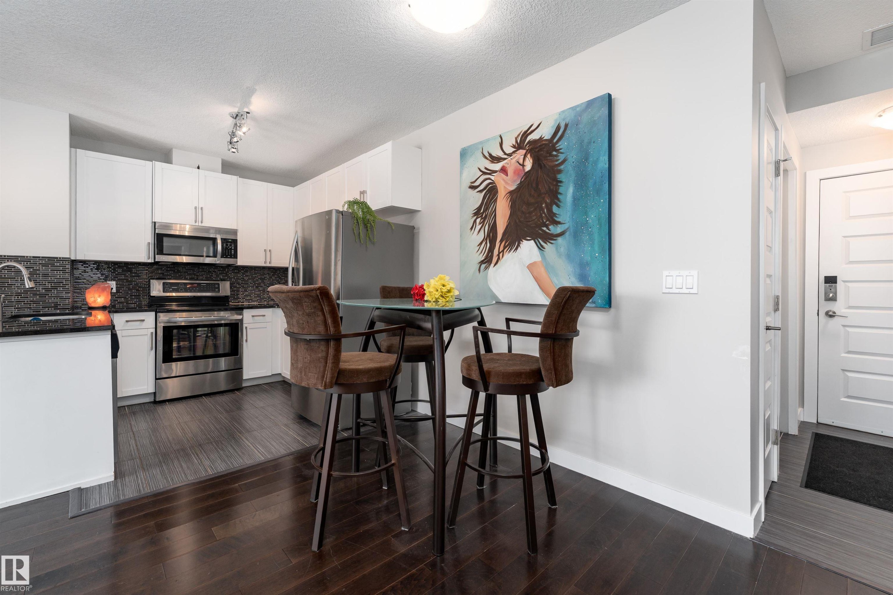 224 5151 Windermere Boulevard, Edmonton, AB - Indoor Photo Showing Kitchen With Stainless Steel Kitchen