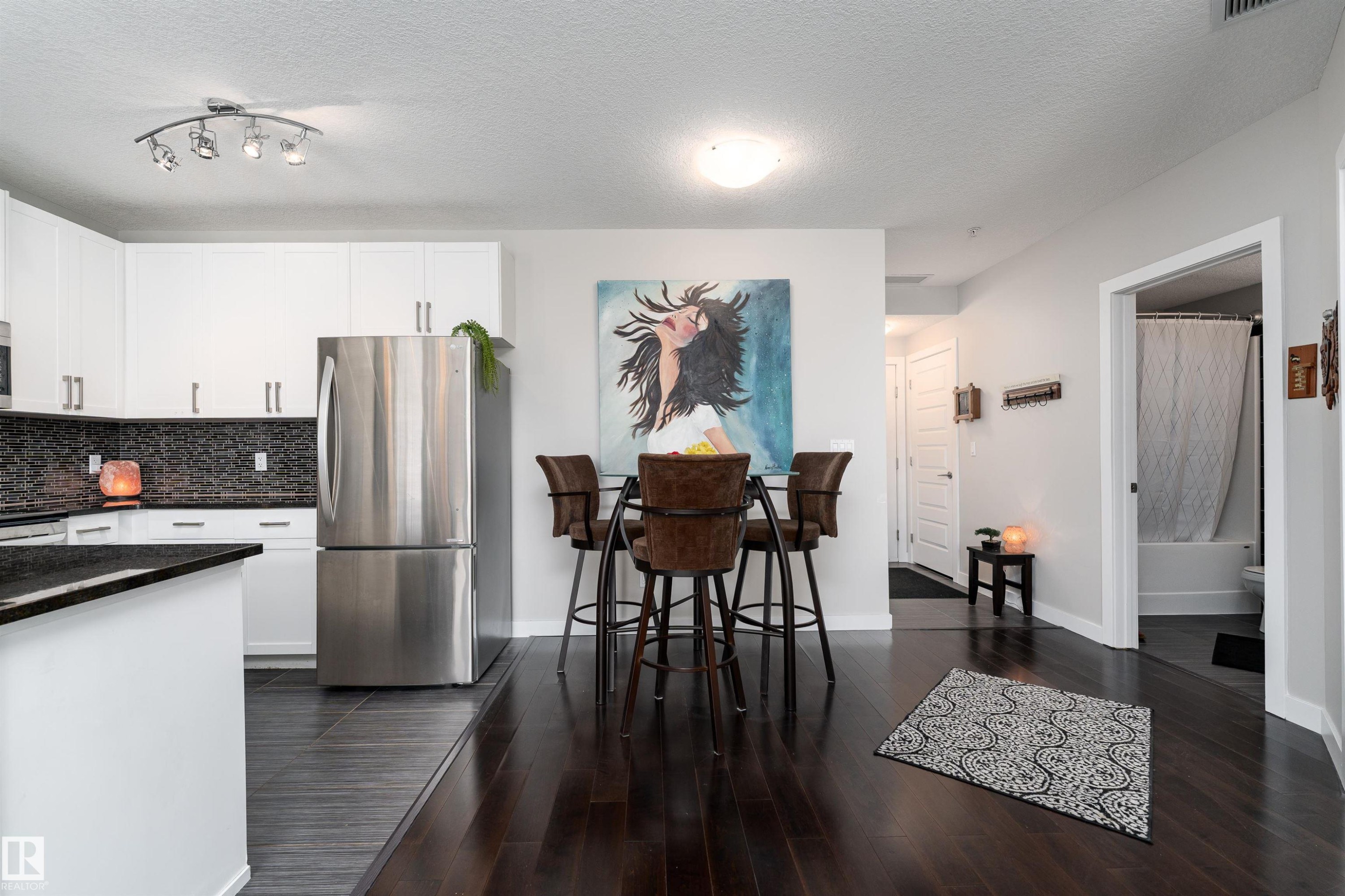 224 5151 Windermere Boulevard, Edmonton, AB - Indoor Photo Showing Kitchen With Stainless Steel Kitchen