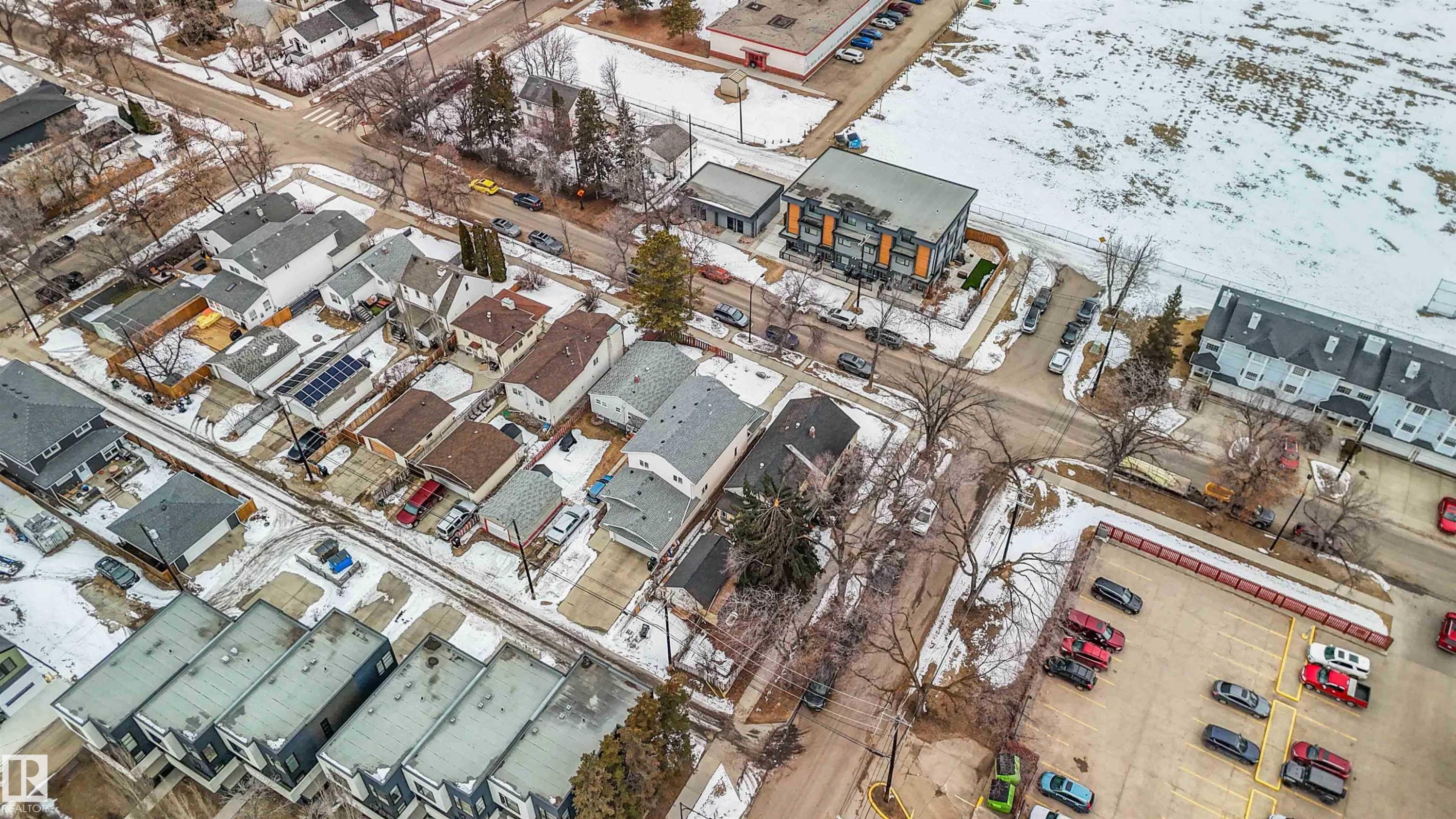 Aerial view of the neighborhood showing a mix of residential properties and surrounding street infrastructure - 10186 143 Street, Edmonton, AB -