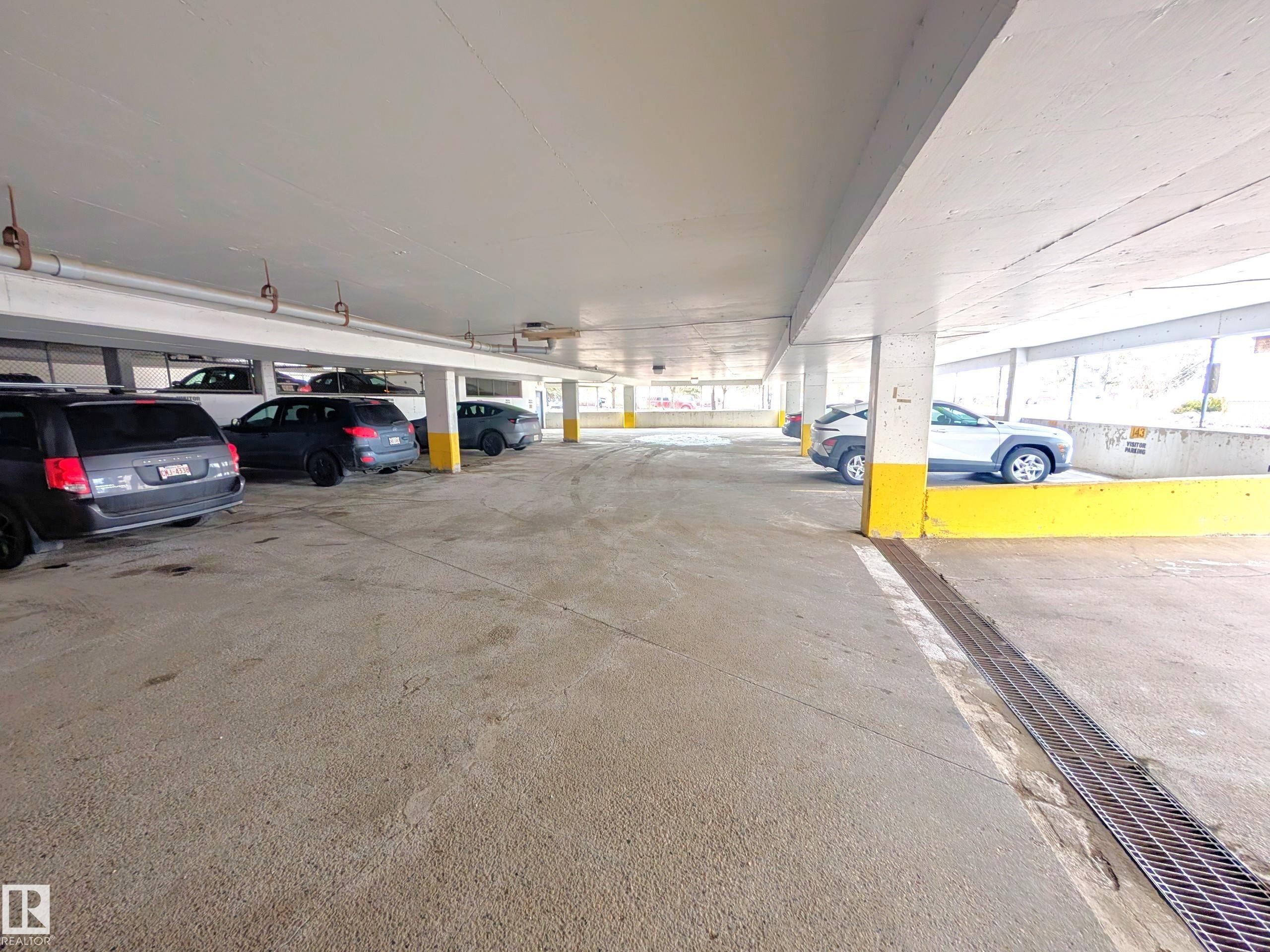 Visitor Parking Area - 1307 10149 Saskatchewan Drive, Edmonton, AB - Indoor Photo Showing Garage
