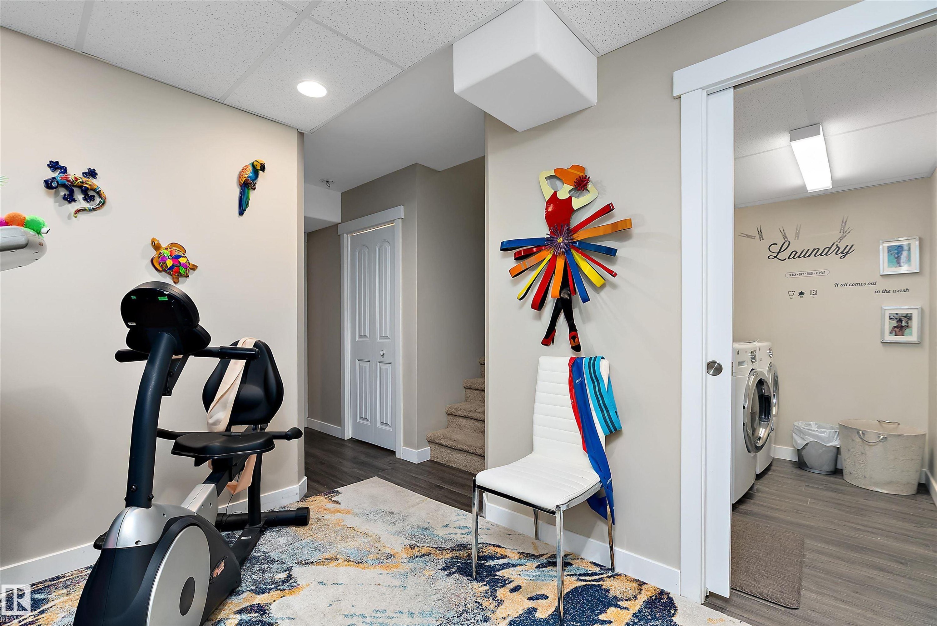 This room features a ceiling fan with integrated lighting, neutral wall colors, and a white six-drawer dresser - 2914 18A Avenue, Edmonton, AB - Indoor Photo Showing Bedroom