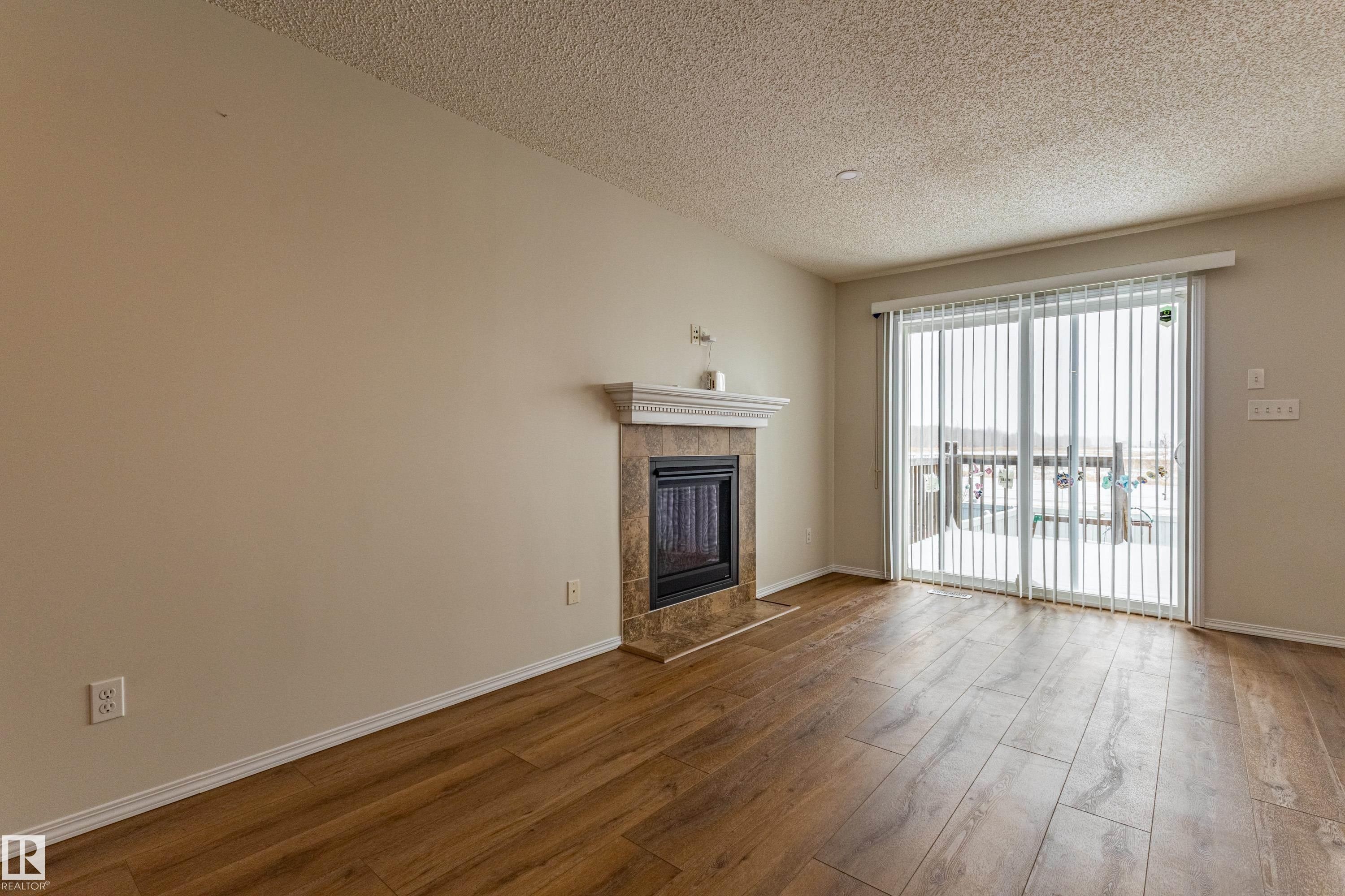 21326 61 Avenue, Edmonton, AB - Indoor Photo Showing Living Room With Fireplace