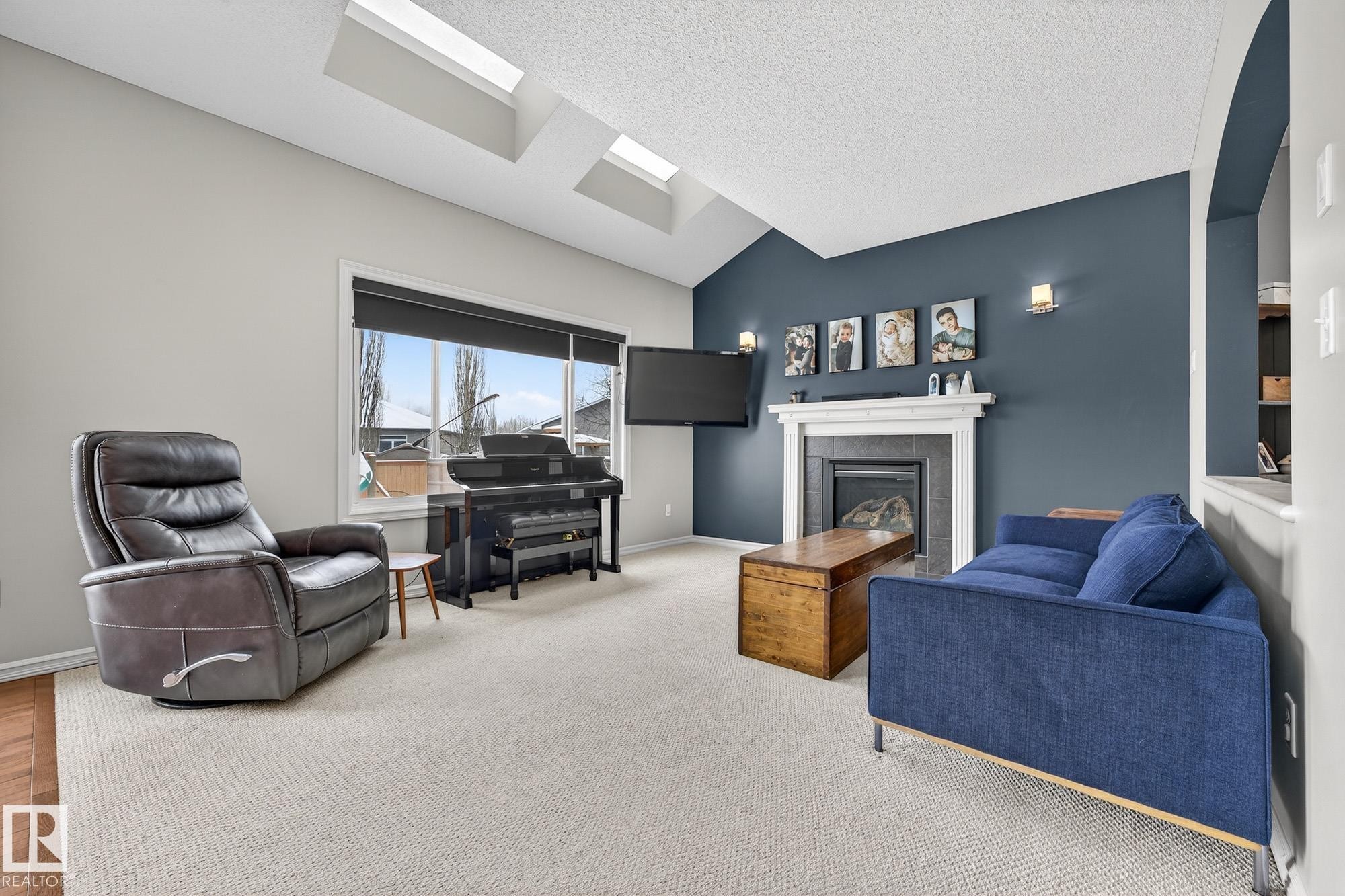 112 Windrose Drive, Leduc, AB - Indoor With Fireplace
