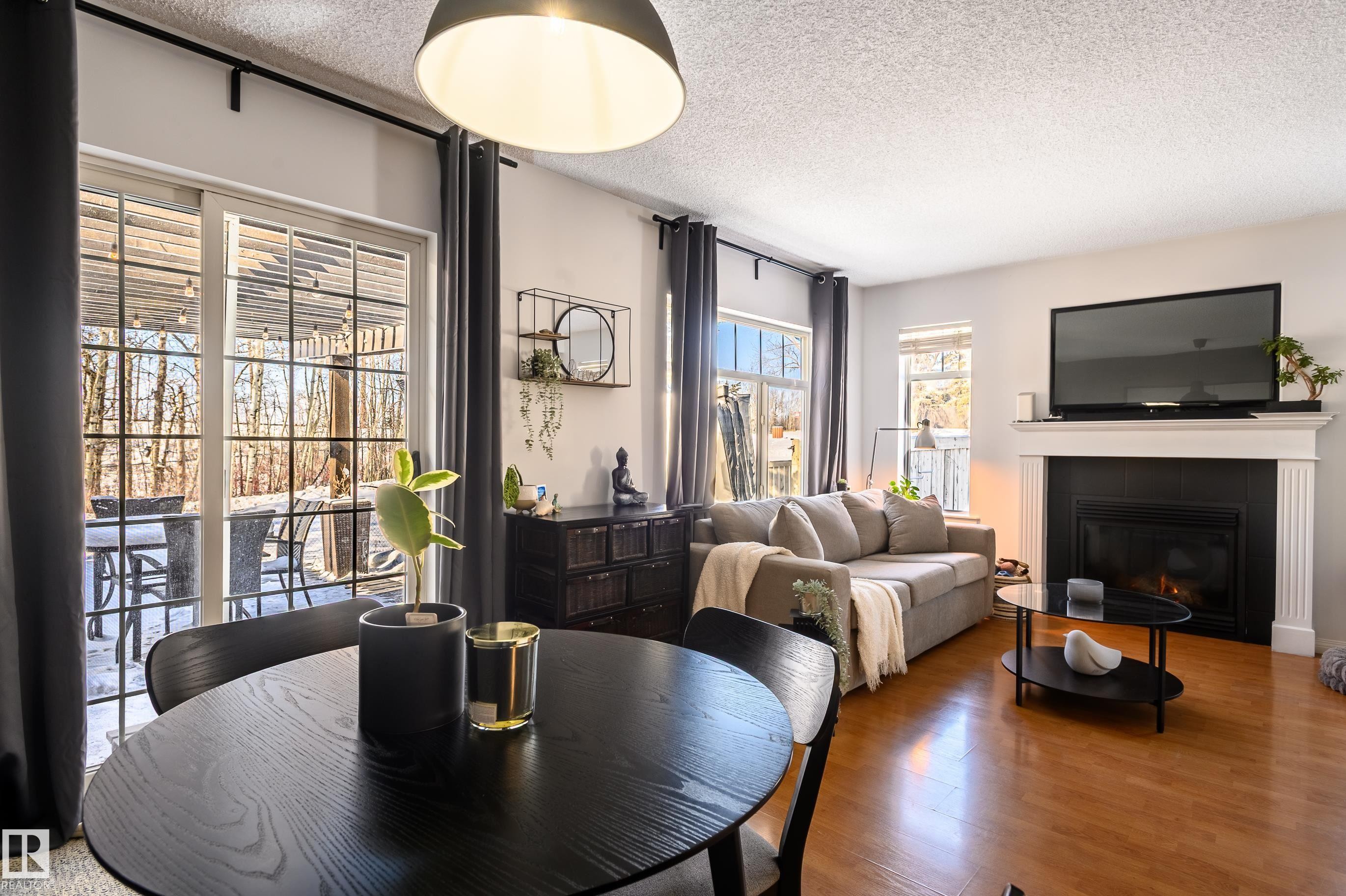 1 30 Levasseur Road, St. Albert, AB - Indoor With Fireplace