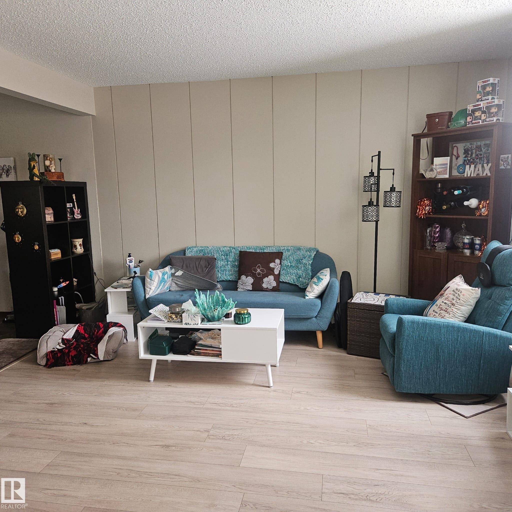 8315 69 Avenue, Edmonton, AB - Indoor Photo Showing Living Room