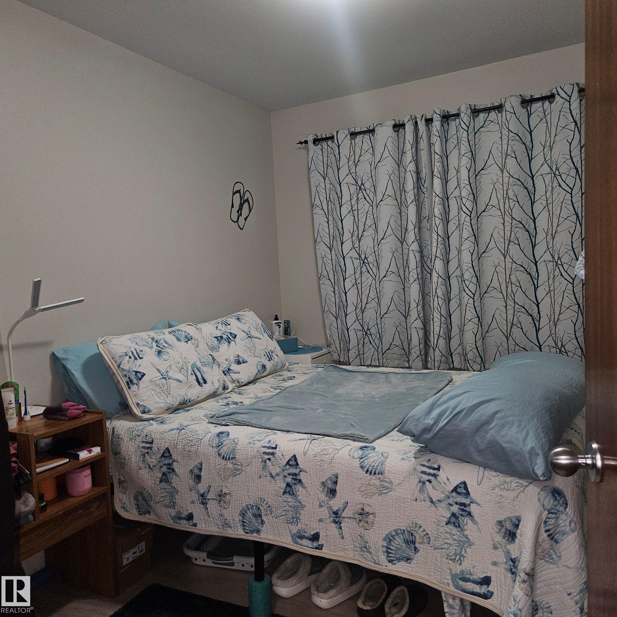 8315 69 Avenue, Edmonton, AB - Indoor Photo Showing Bedroom