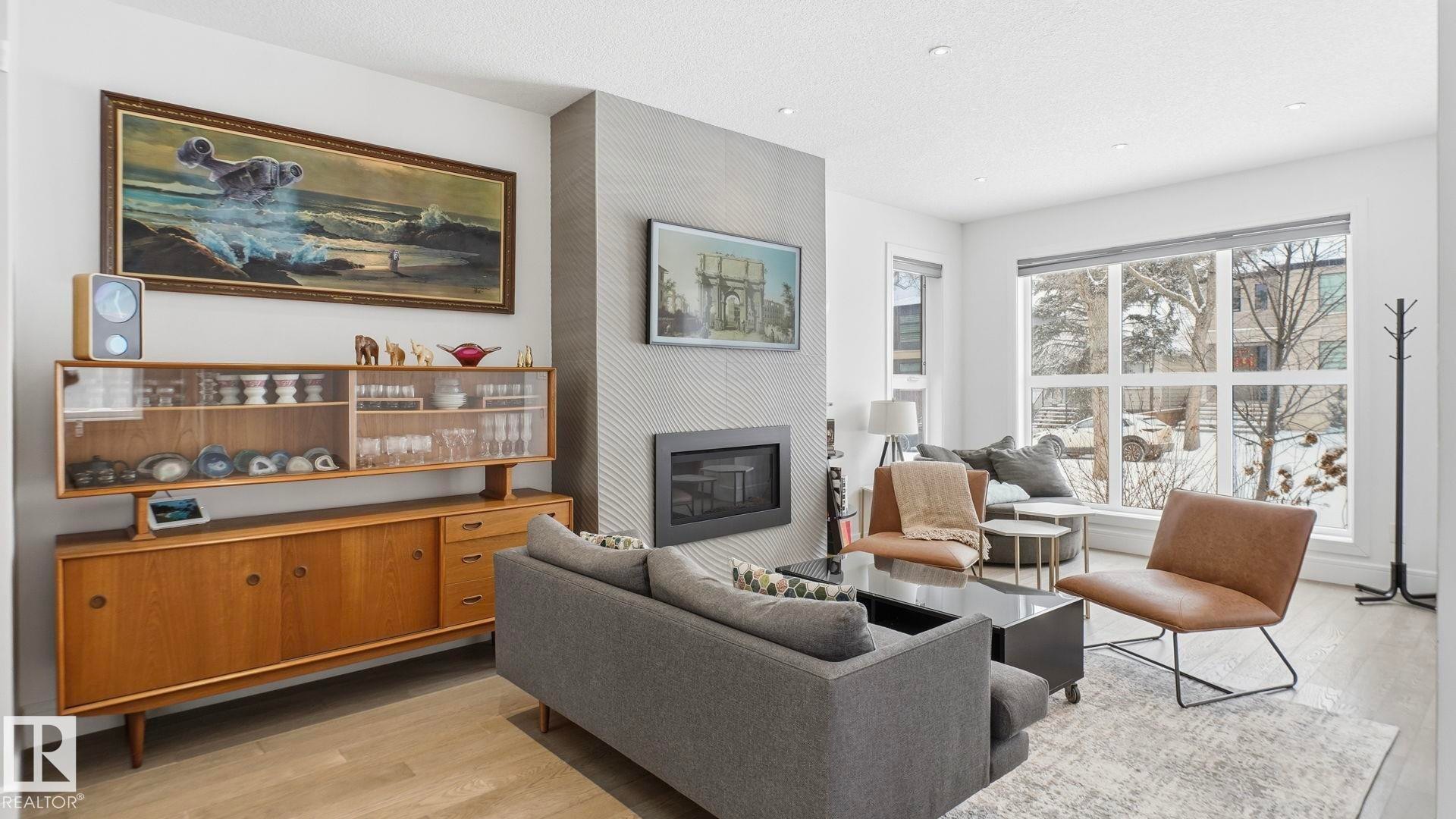 10817 75 Avenue, Edmonton, AB - Indoor Photo Showing Living Room With Fireplace