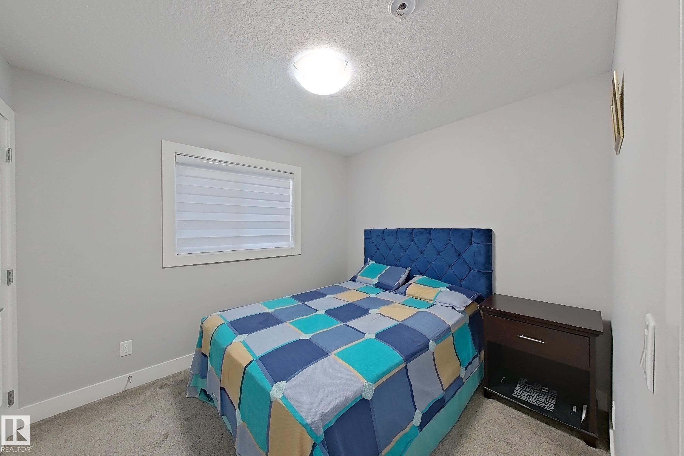 3107 13 Avenue, Edmonton, AB - Indoor Photo Showing Bedroom
