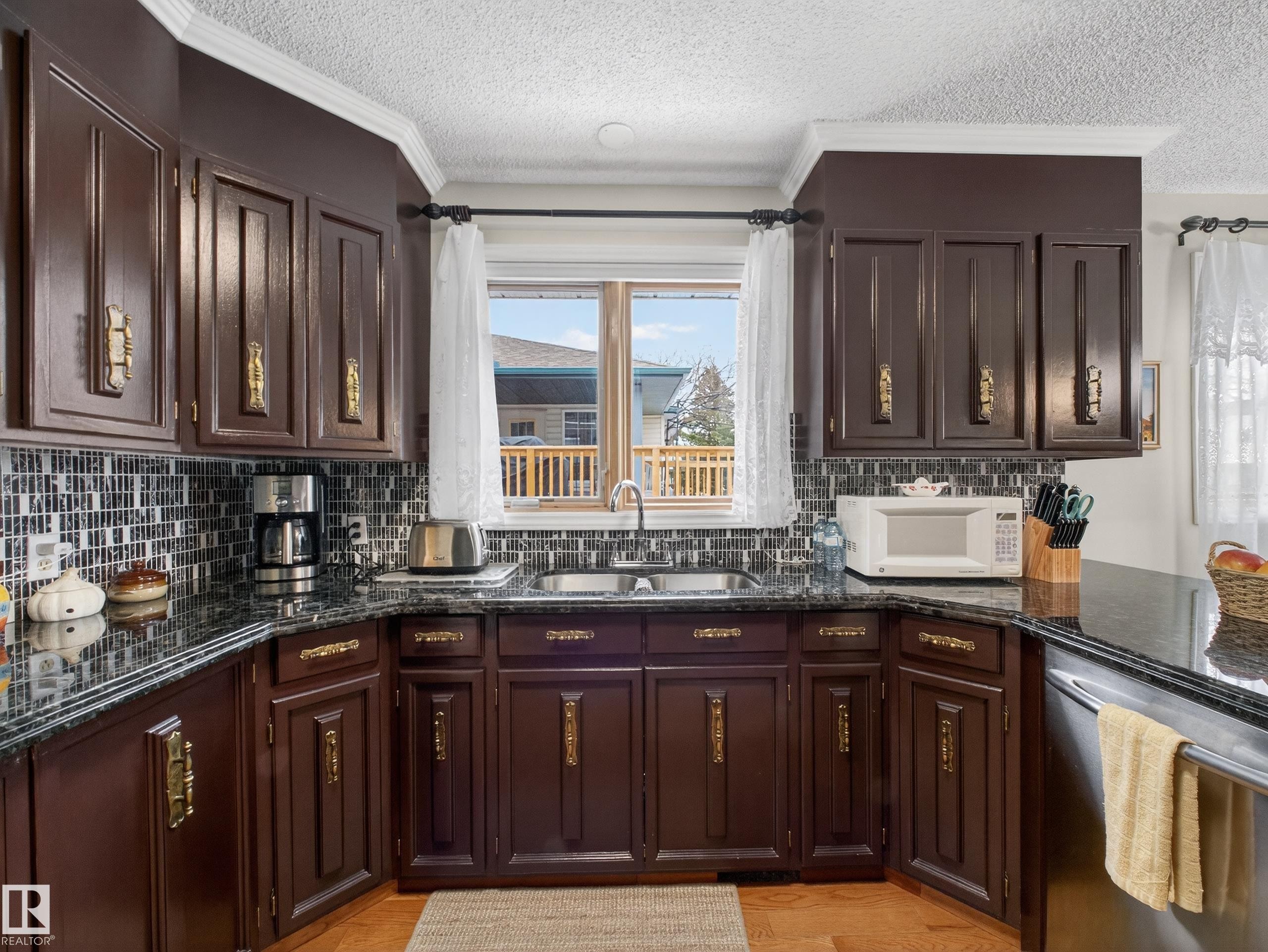 8906 83 Avenue, Edmonton, AB - Indoor Photo Showing Kitchen With Double Sink
