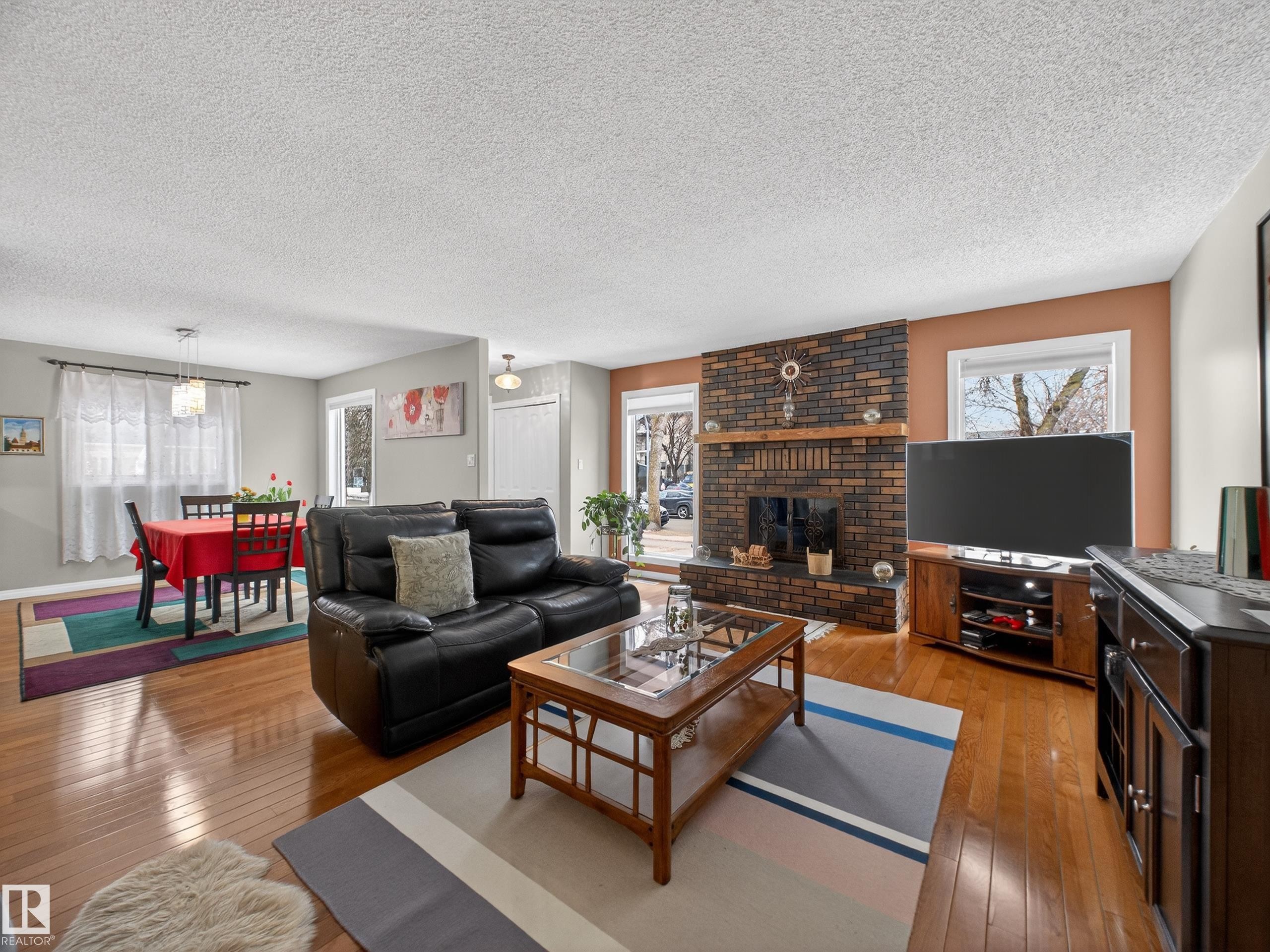 8906 83 Avenue, Edmonton, AB - Indoor Photo Showing Living Room With Fireplace