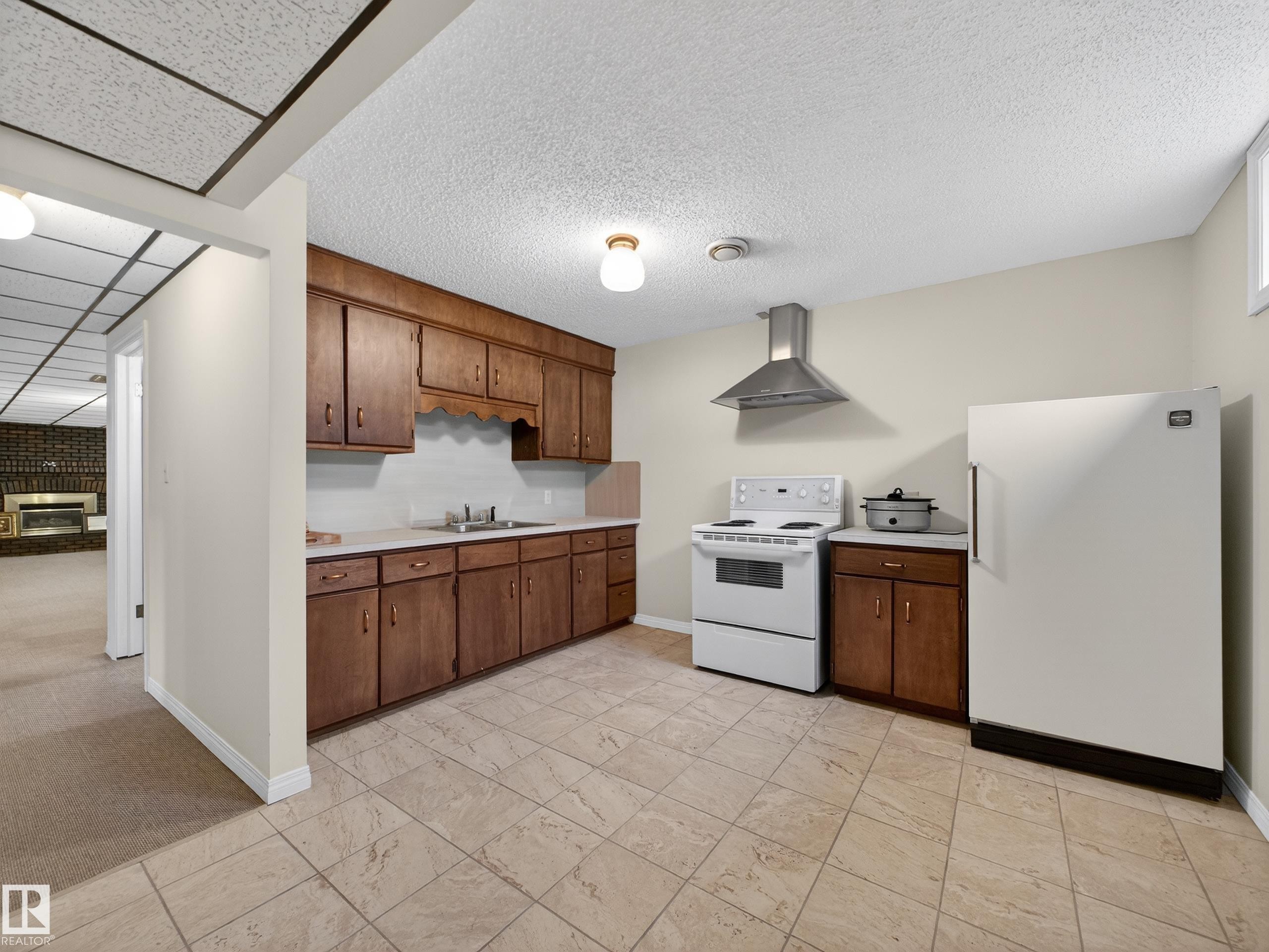 8906 83 Avenue, Edmonton, AB - Indoor Photo Showing Kitchen With Double Sink