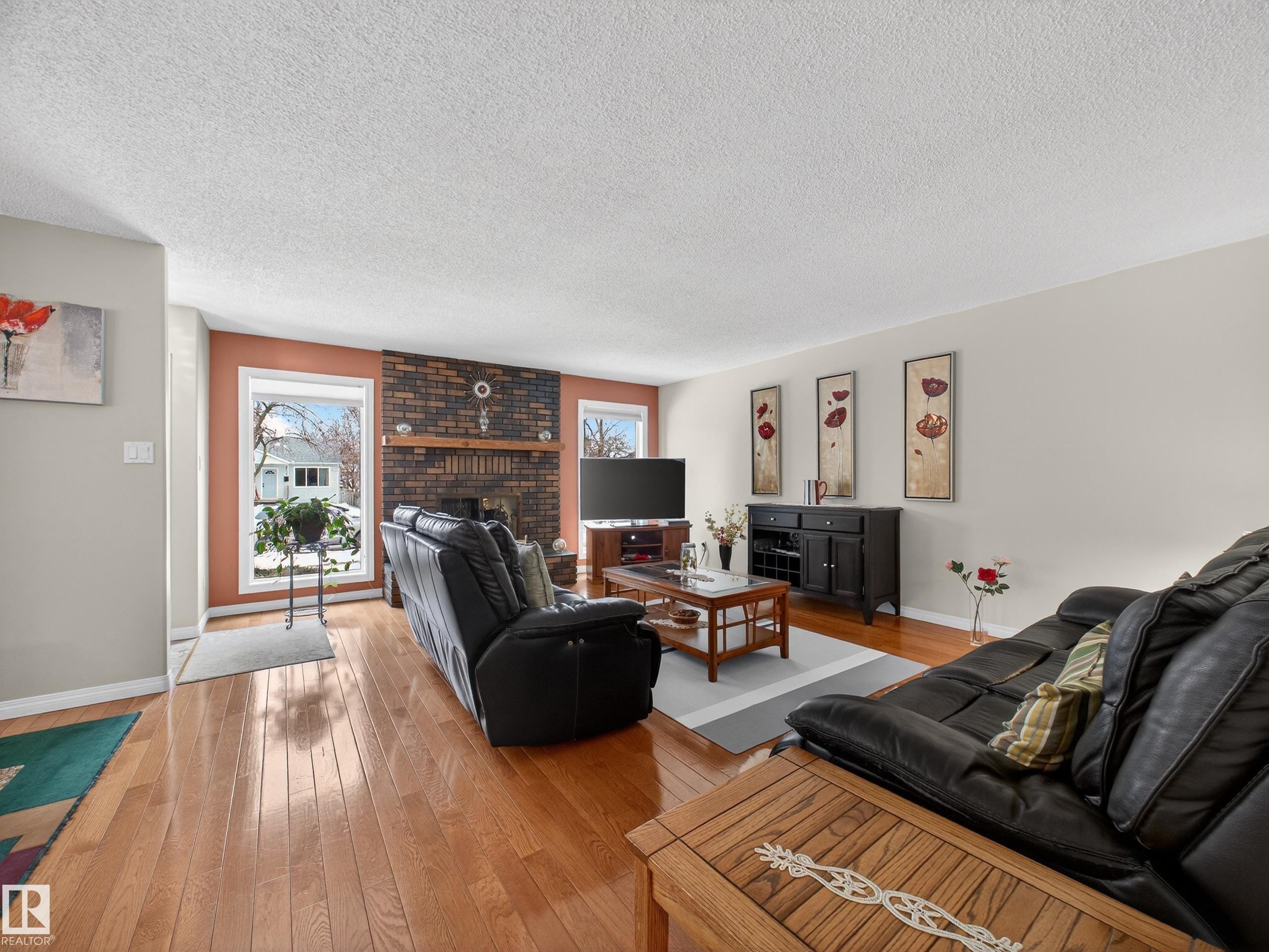 8906 83 Avenue, Edmonton, AB - Indoor Photo Showing Living Room With Fireplace