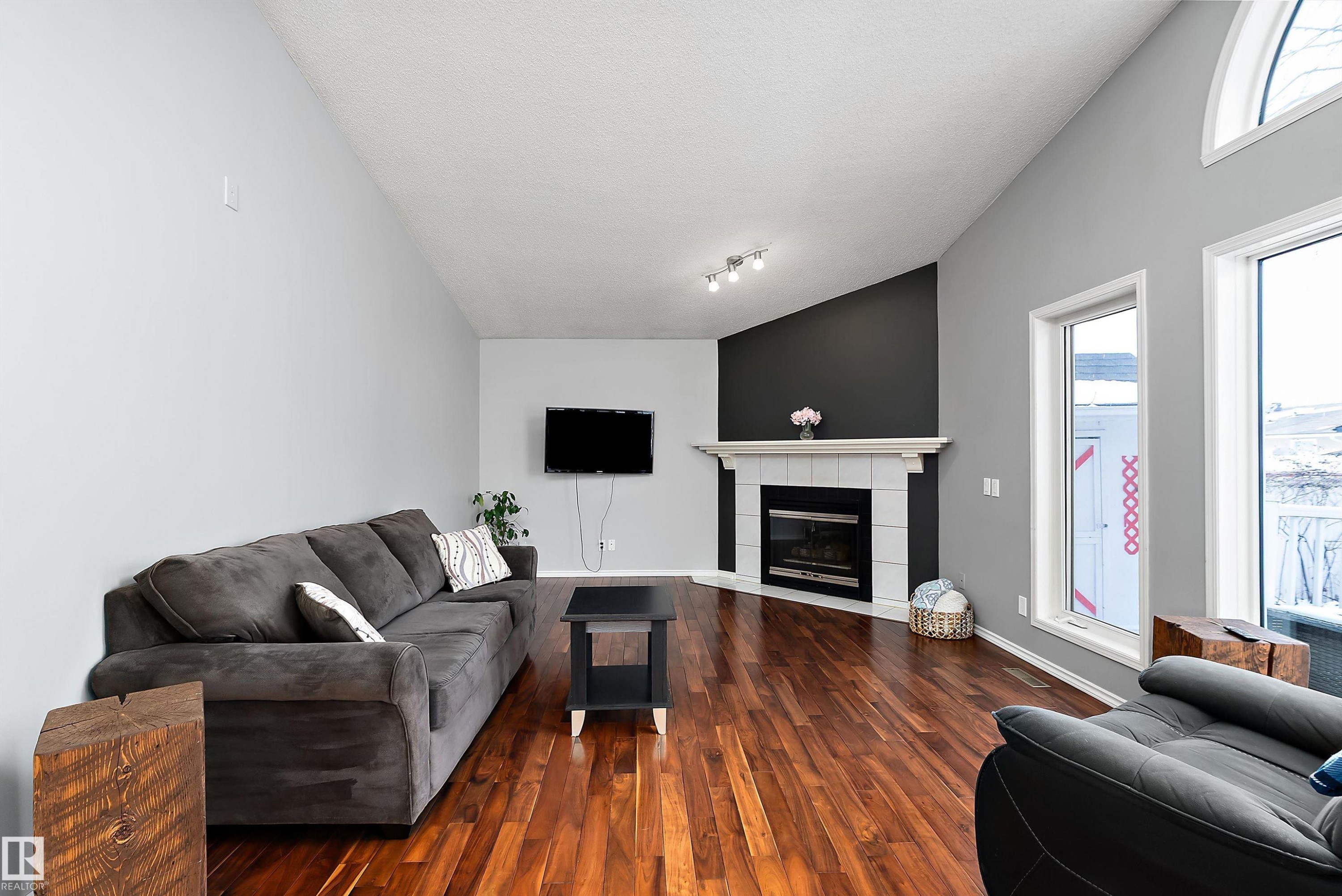 3706 131A Avenue, Edmonton, AB - Indoor Photo Showing Living Room With Fireplace