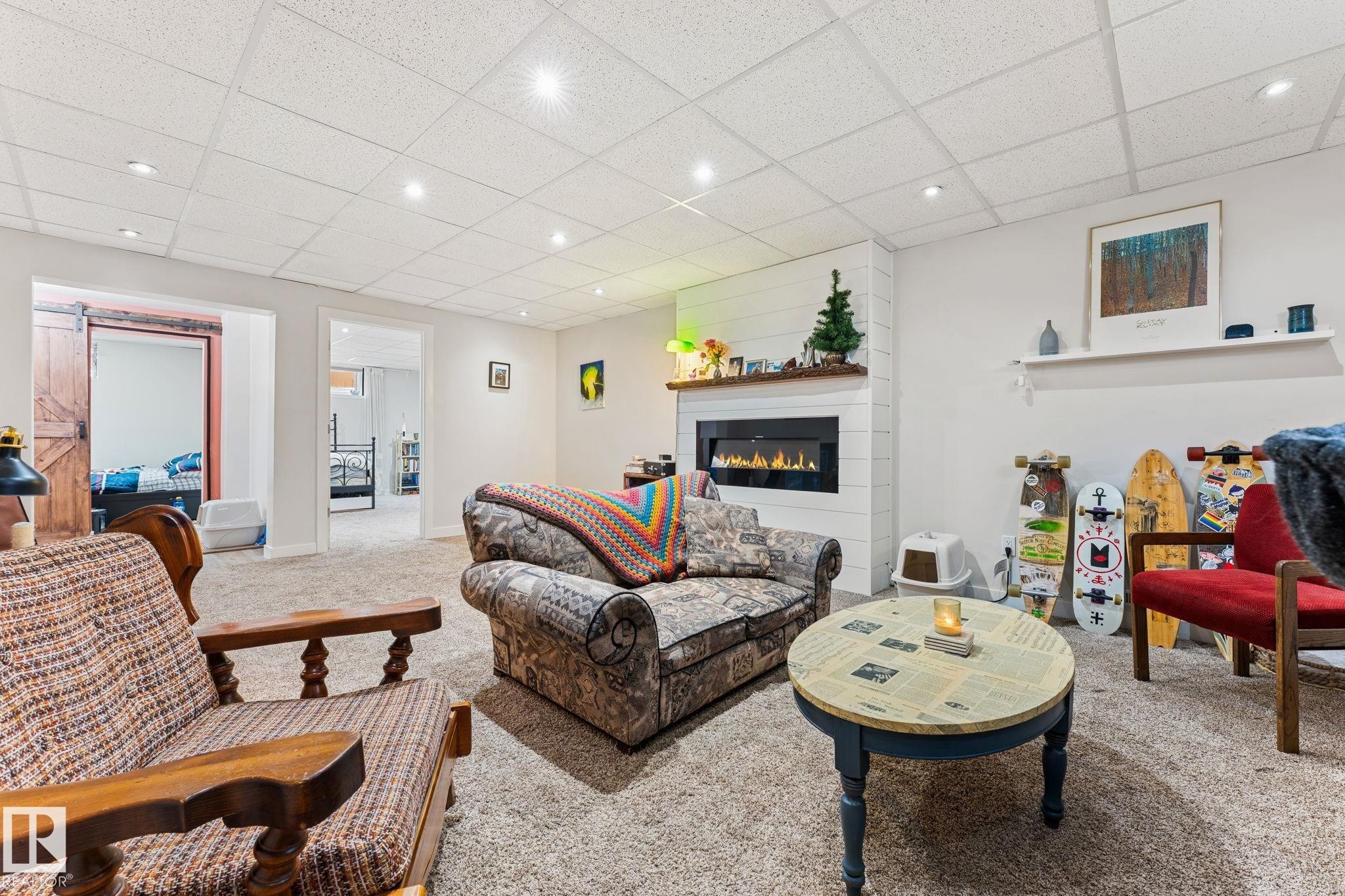 11712 48 Avenue, Edmonton, AB - Indoor Photo Showing Living Room With Fireplace
