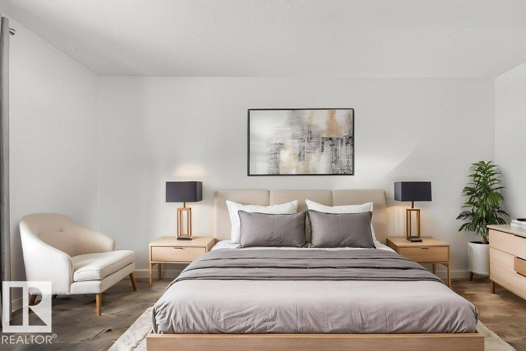 Staged version of the primary bedroom - 91 Hearthstone, Edmonton, AB - Indoor Photo Showing Bedroom