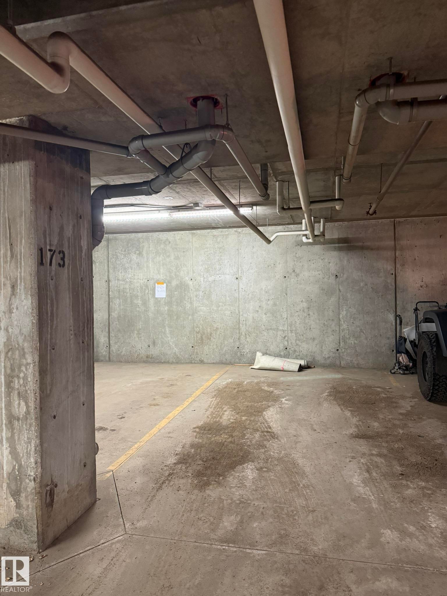 Underground parking - 119 344 Windermere Road, Edmonton, AB - Indoor Photo Showing Garage