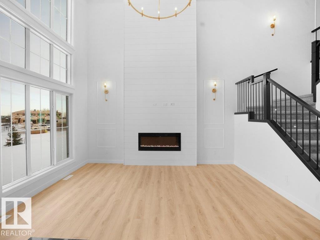 3282 Chernowski Way, Edmonton, AB - Indoor Photo Showing Other Room With Fireplace