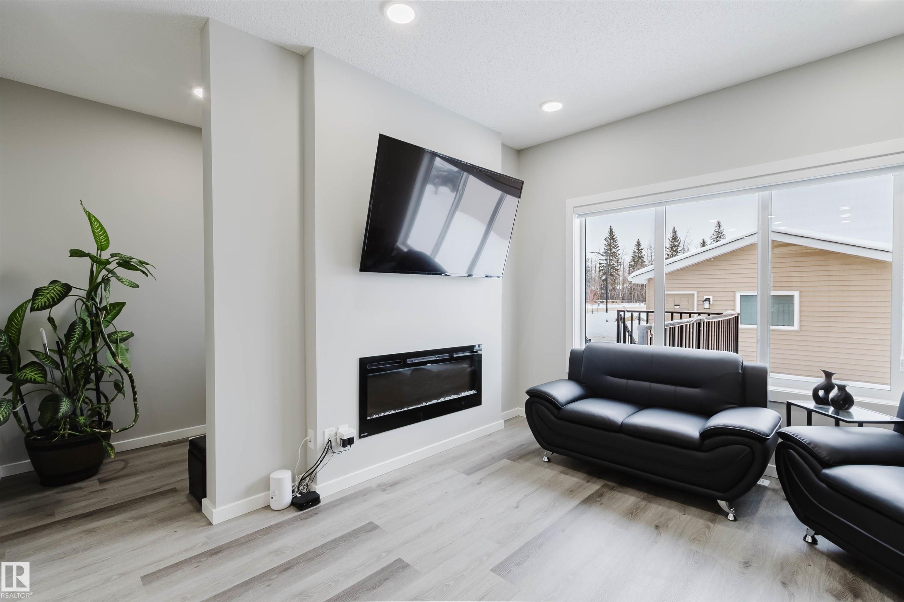 343 Edgemont Drive, Edmonton, AB - Indoor Photo Showing Living Room With Fireplace
