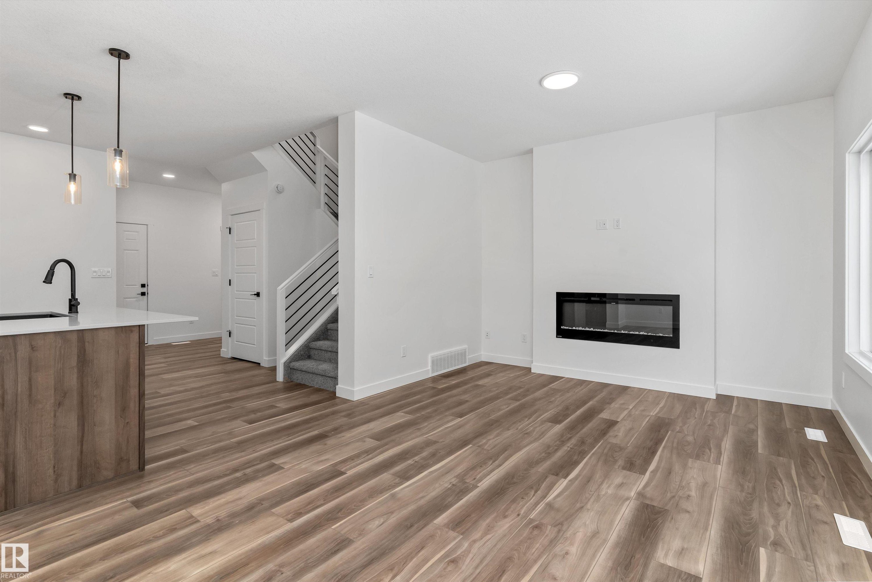 4236 208 Street, Edmonton, AB - Indoor Photo Showing Living Room With Fireplace