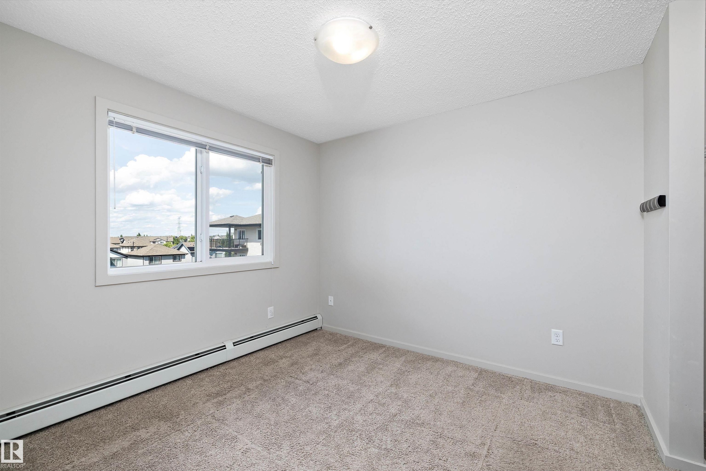 414 5404 7 Ave, Edmonton, AB - Indoor Photo Showing Other Room