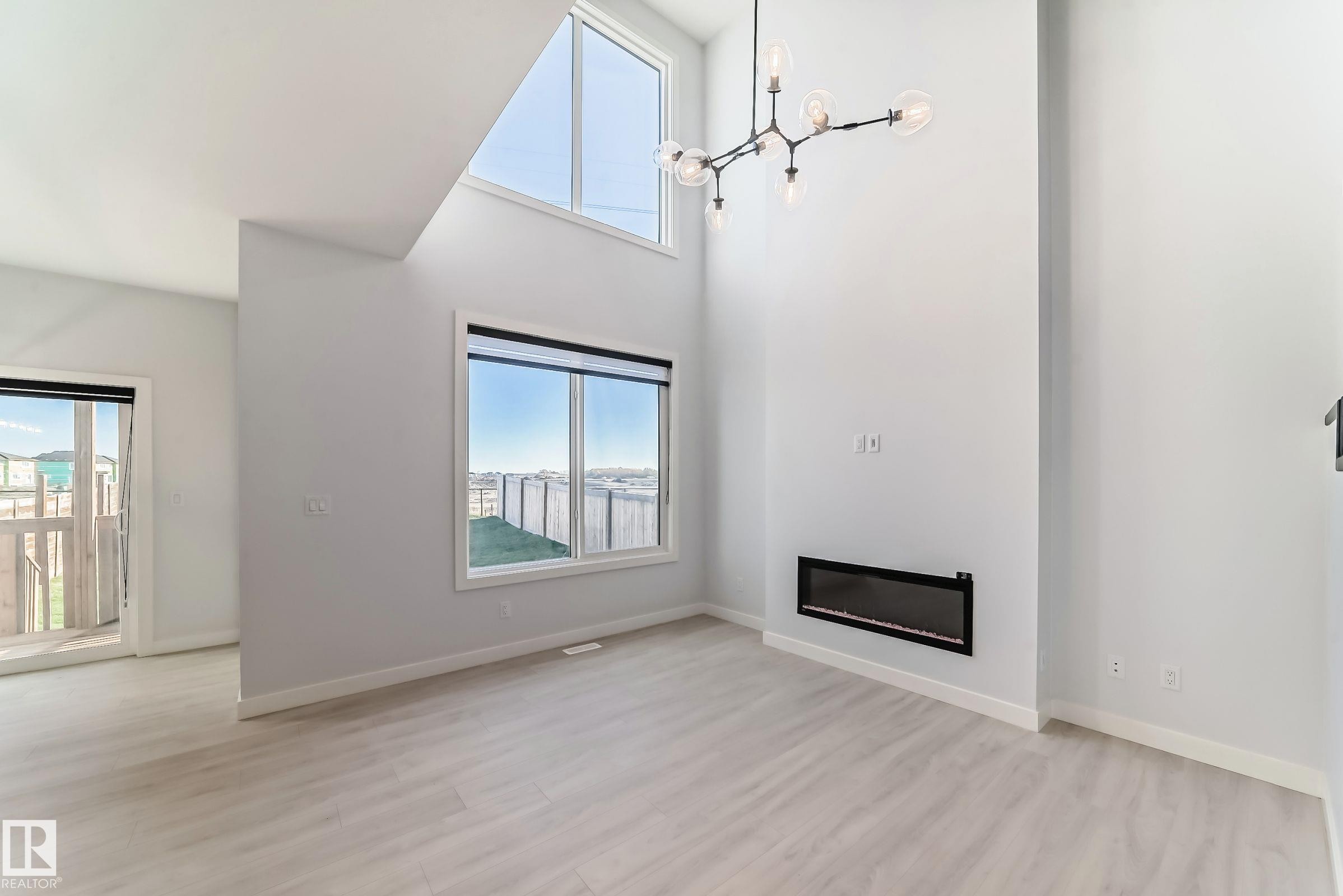 9411 Pear Crescent, Edmonton, AB - Indoor Photo Showing Other Room With Fireplace