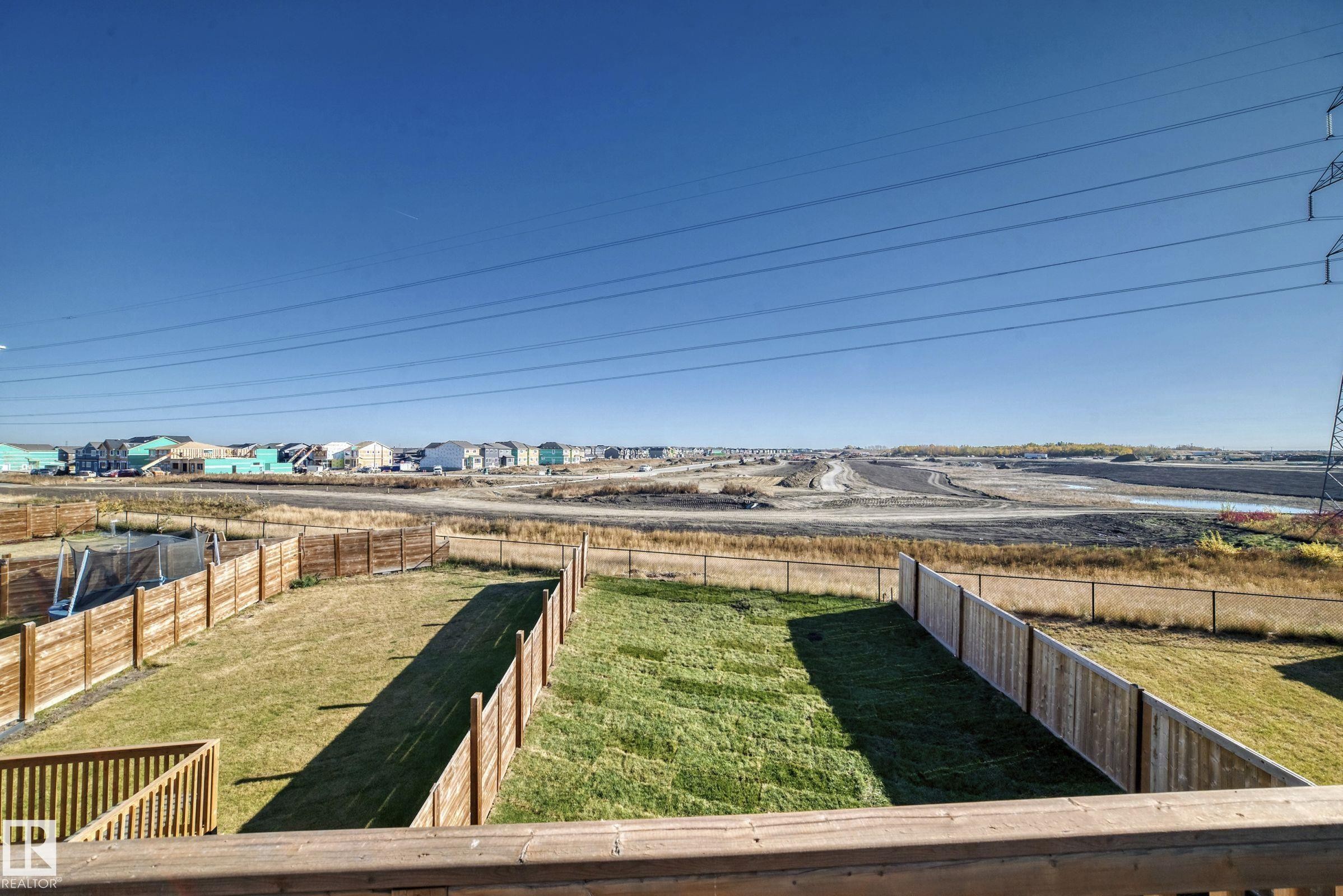 Private deck off of the primary bedroom. Enjoy your coffee here! - 9411 Pear Crescent, Edmonton, AB - Outdoor With View