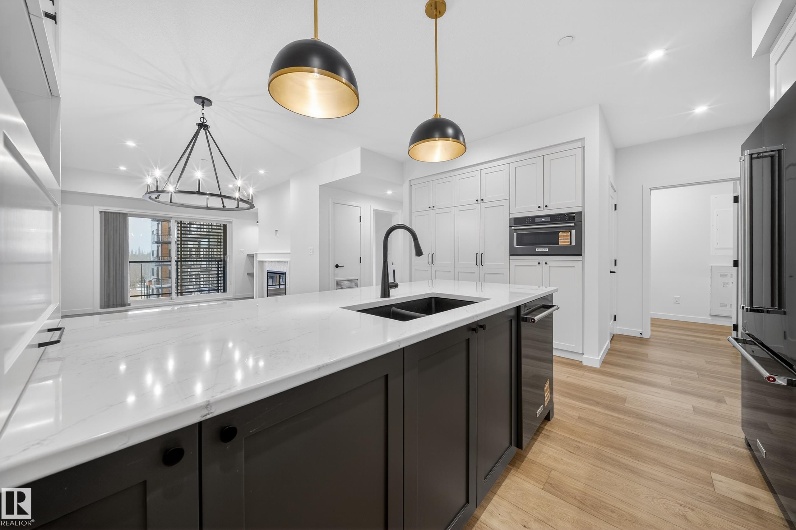 301 7459 May Common, Edmonton, AB - Indoor Photo Showing Kitchen With Double Sink With Upgraded Kitchen