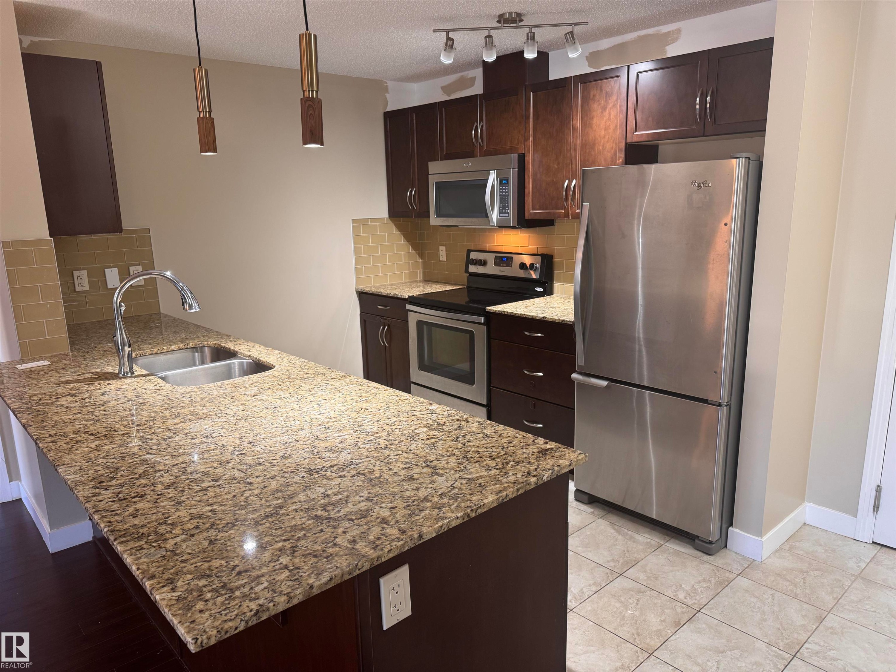 224 2045 Grantham Court, Edmonton, AB - Indoor Photo Showing Kitchen With Stainless Steel Kitchen With Double Sink