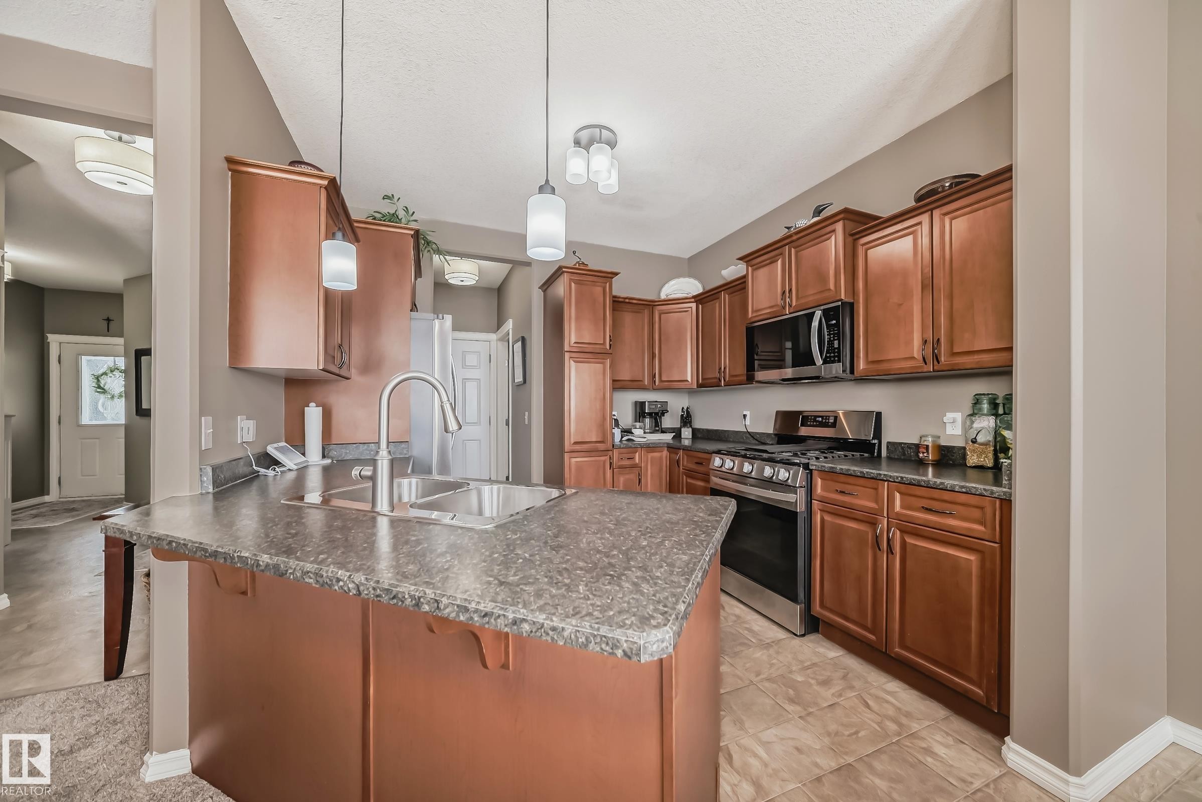 104 Westerra Boulevard, Stony Plain, AB - Indoor Photo Showing Kitchen With Stainless Steel Kitchen With Double Sink
