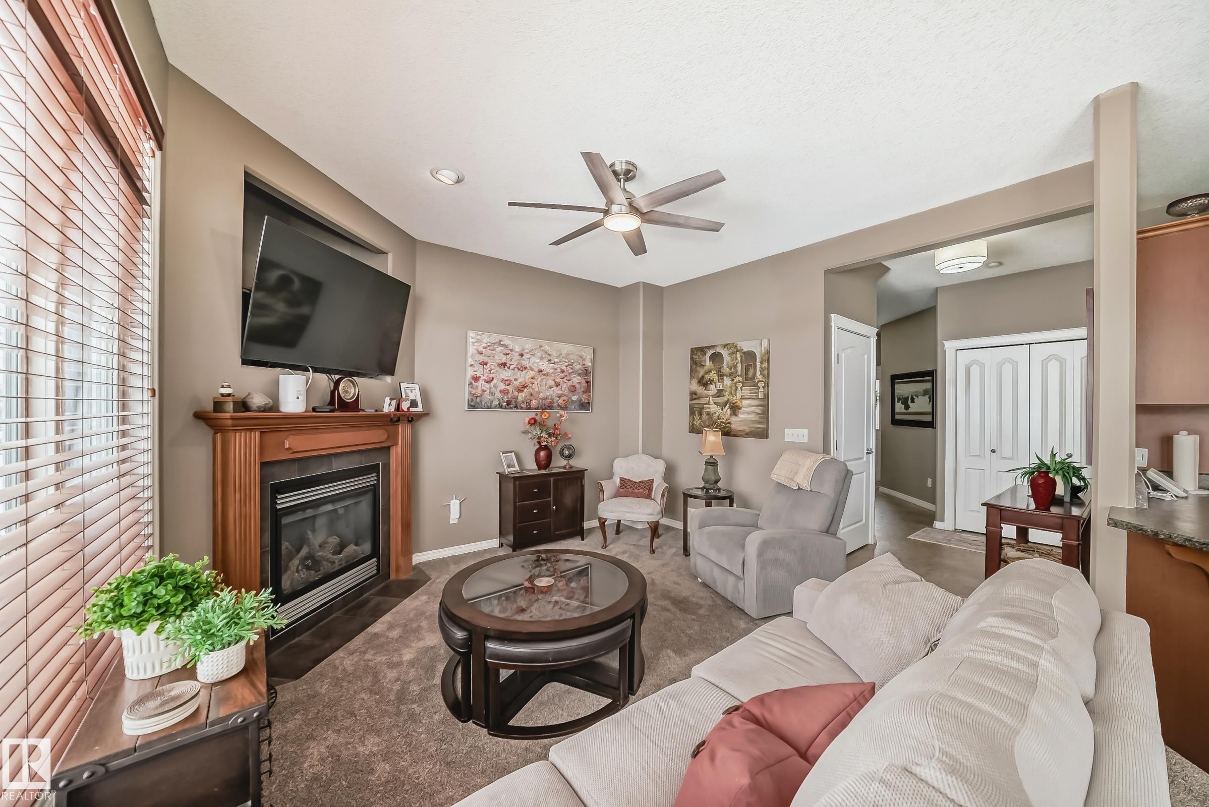 104 Westerra Boulevard, Stony Plain, AB - Indoor Photo Showing Living Room With Fireplace