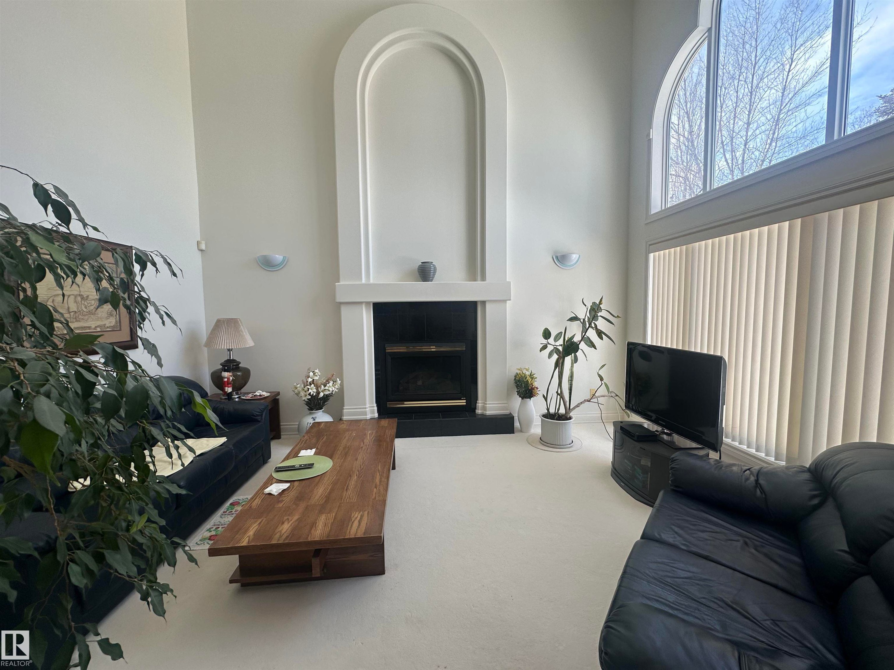 11524 14A Avenue, Edmonton, AB - Indoor Photo Showing Living Room With Fireplace